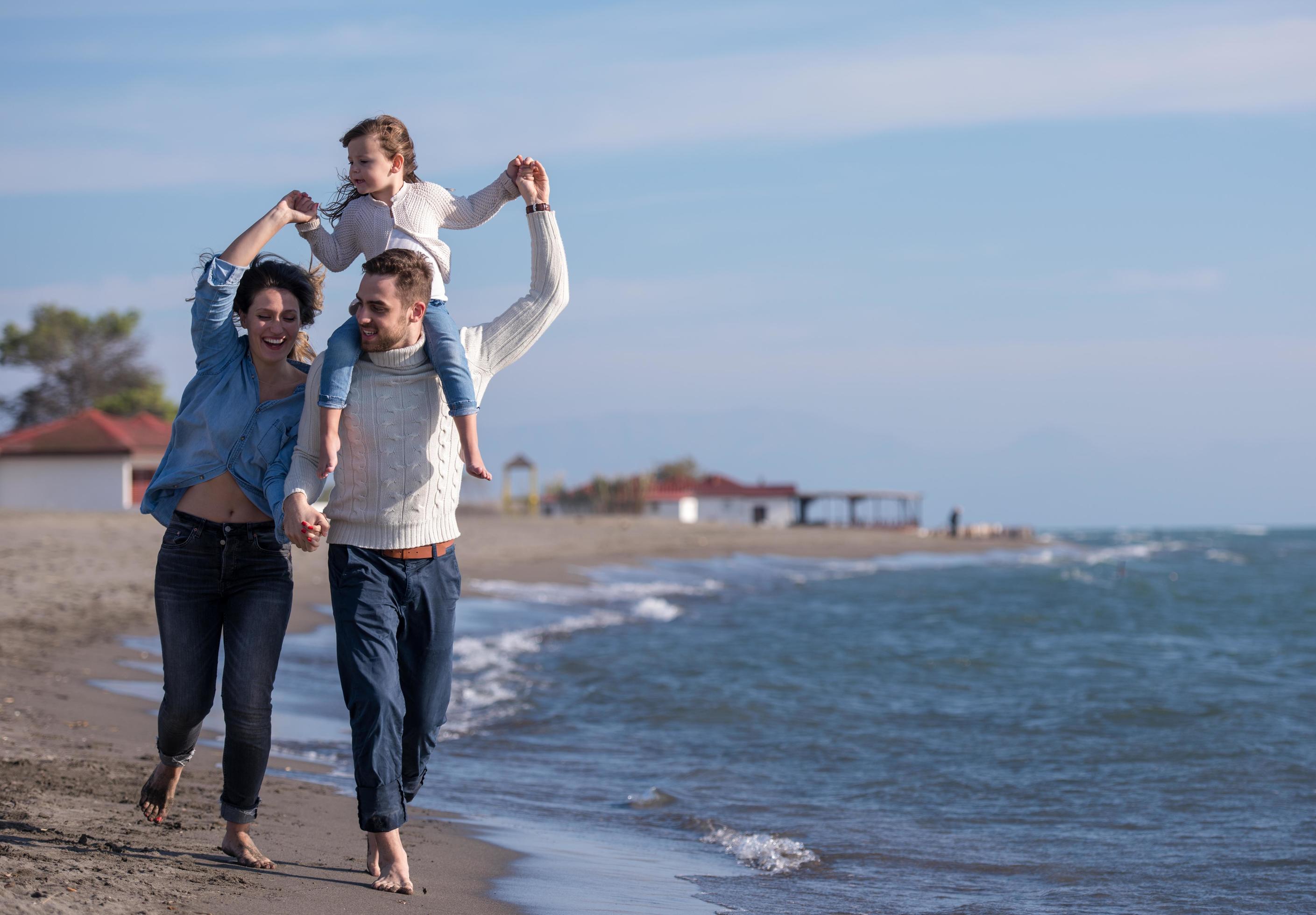 Young family enjoying vecation during autumn Stock Free