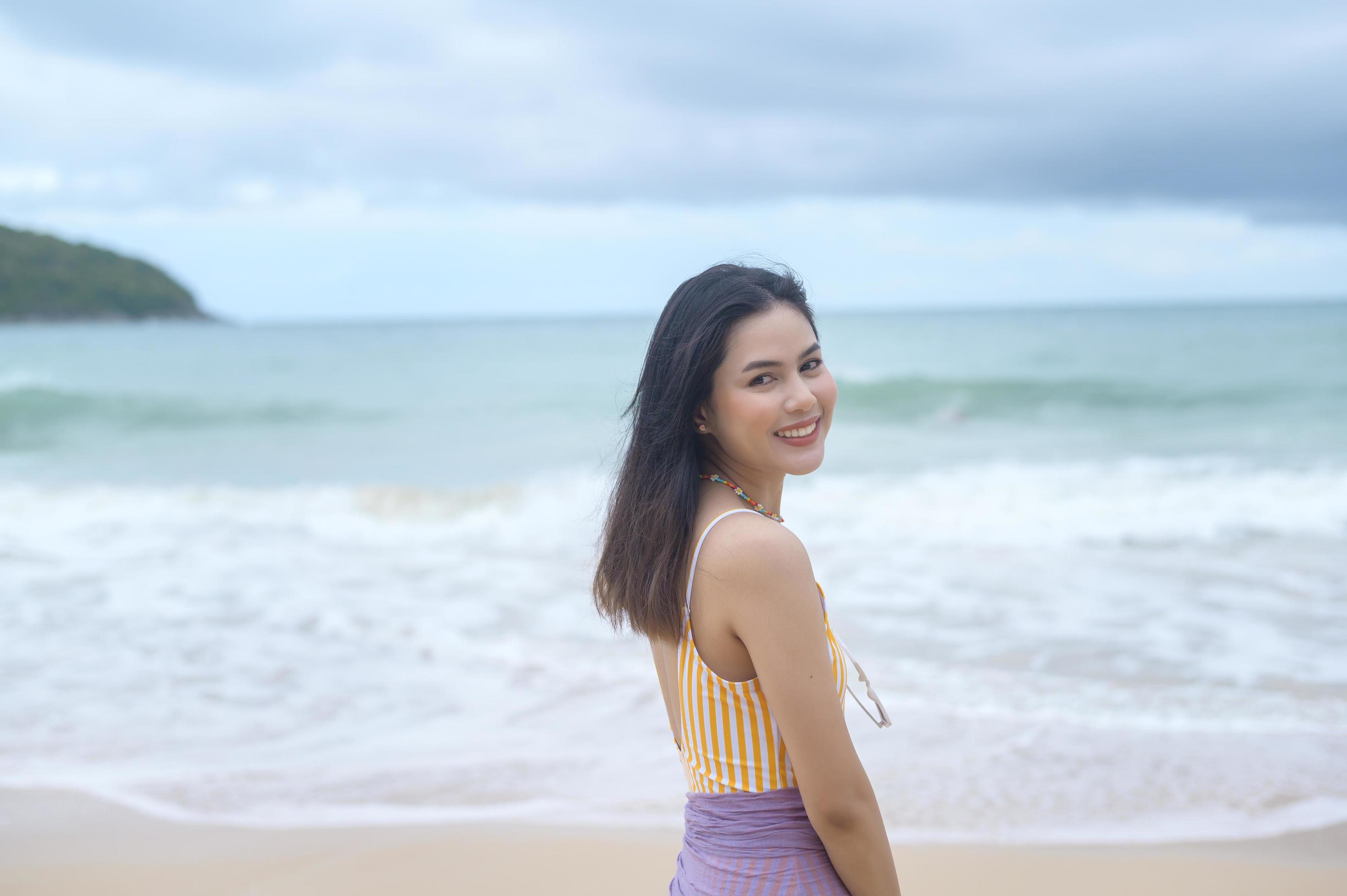 Young Beautiful woman in Bikini enjoying and relaxing on the beach, Summer, vacation, holidays, Lifestyles concept. Stock Free