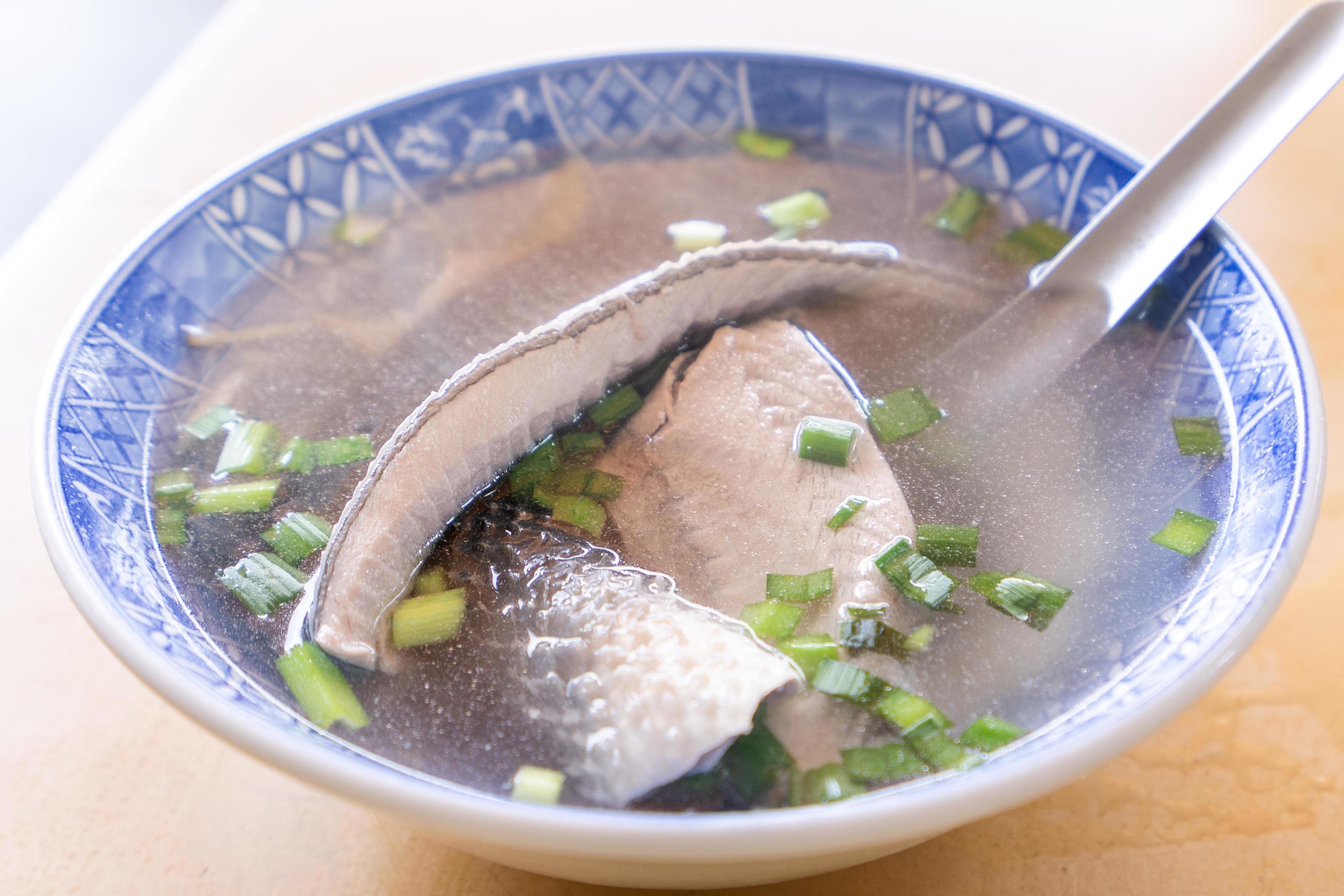 Milkfish skin soup, distinctive Taiwan delicacy food in Tainan. Famous meal set for lunch or breakfast with vegetable, top view, copy space, close up Stock Free