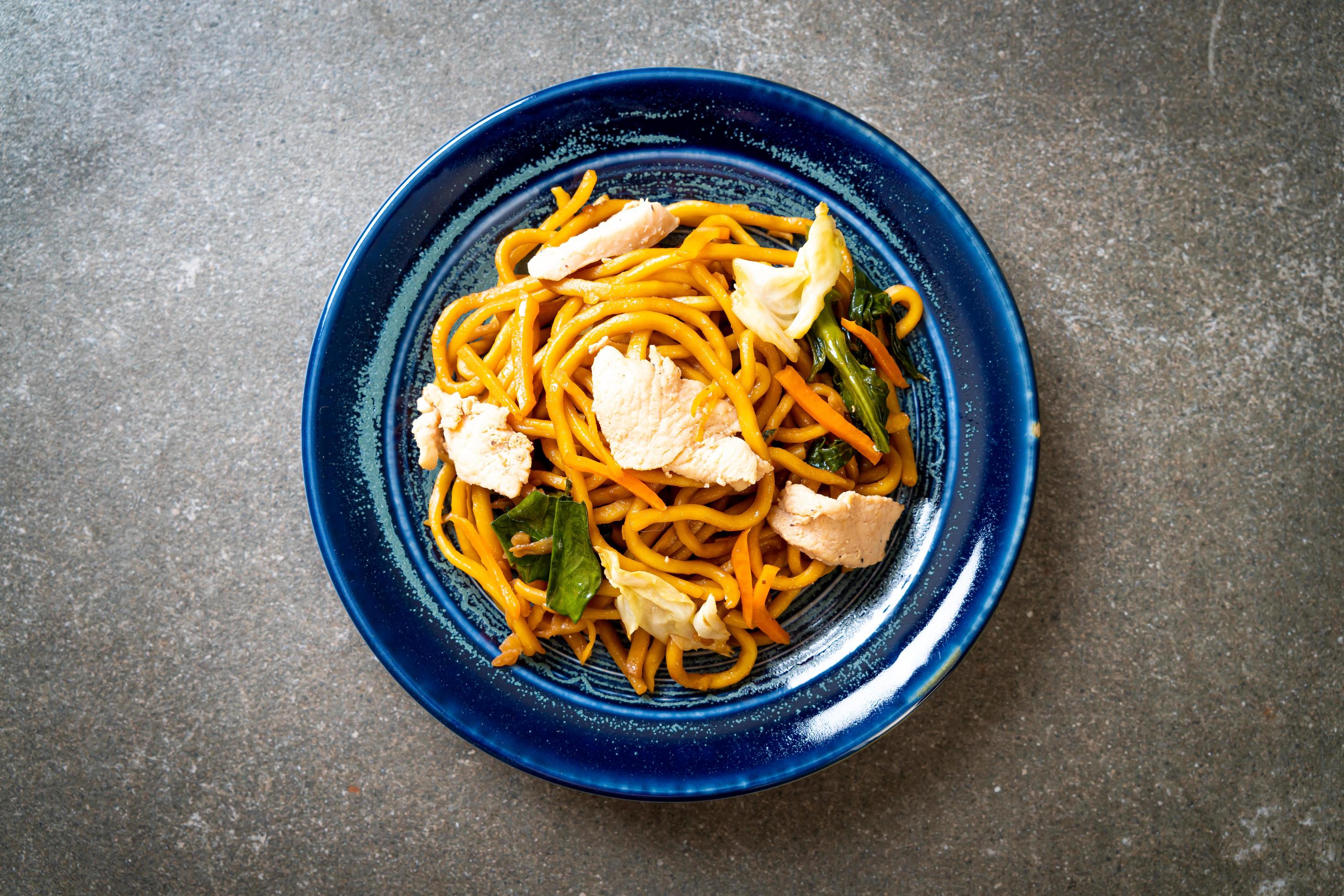 Stir-fried yakisoba noodles with chicken- Asian food style Stock Free