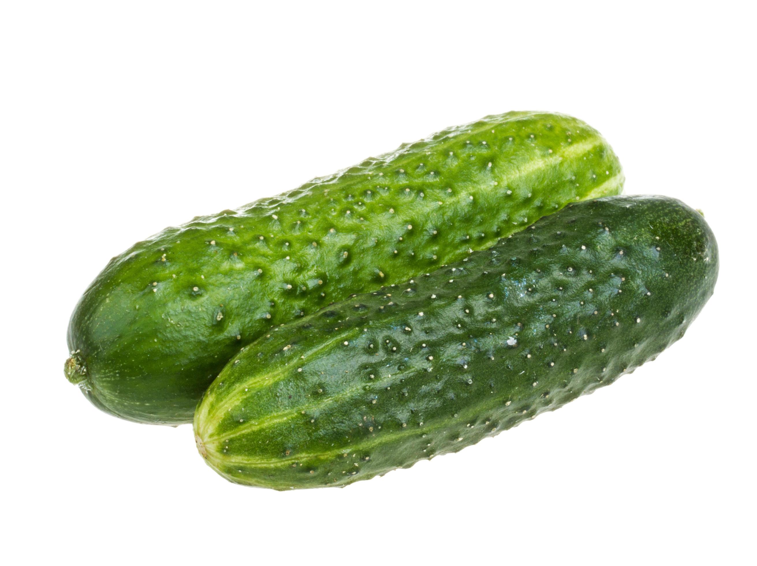 Healthy food. The green cucumbers isolated on white background Stock Free