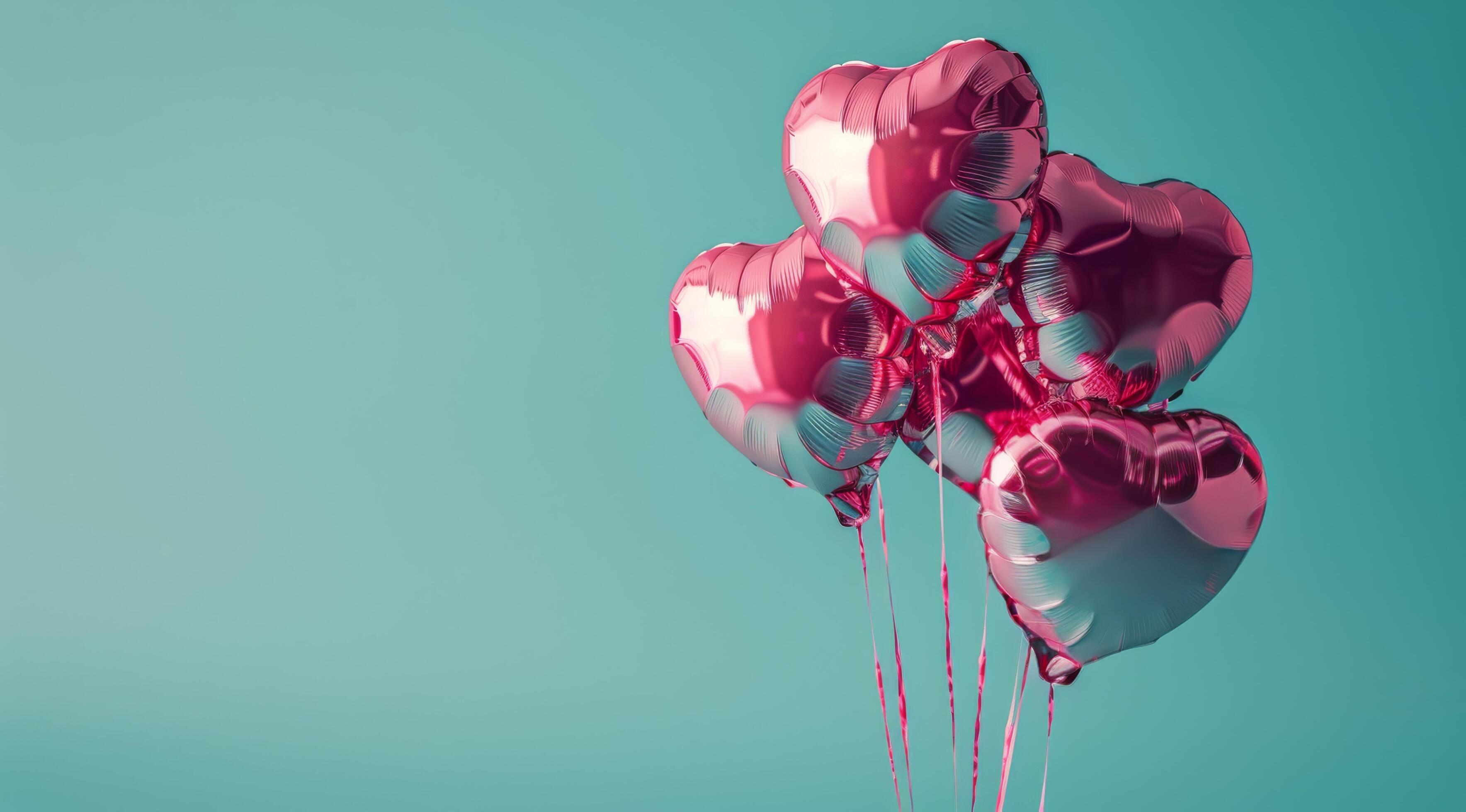 Pink Heart Balloons Against Teal Background Stock Free