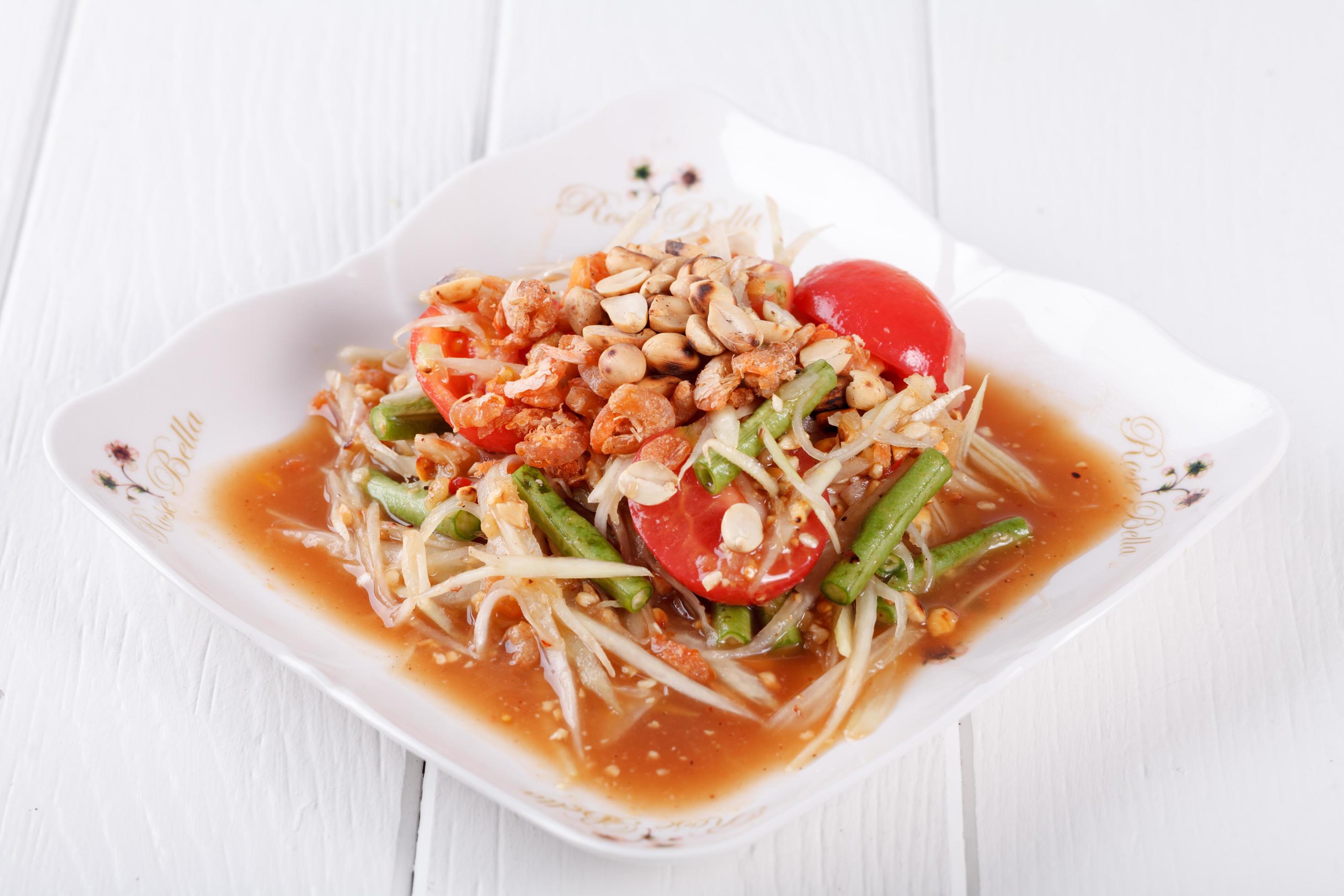 Somtum, papaya salad delicious food in thailand Stock Free