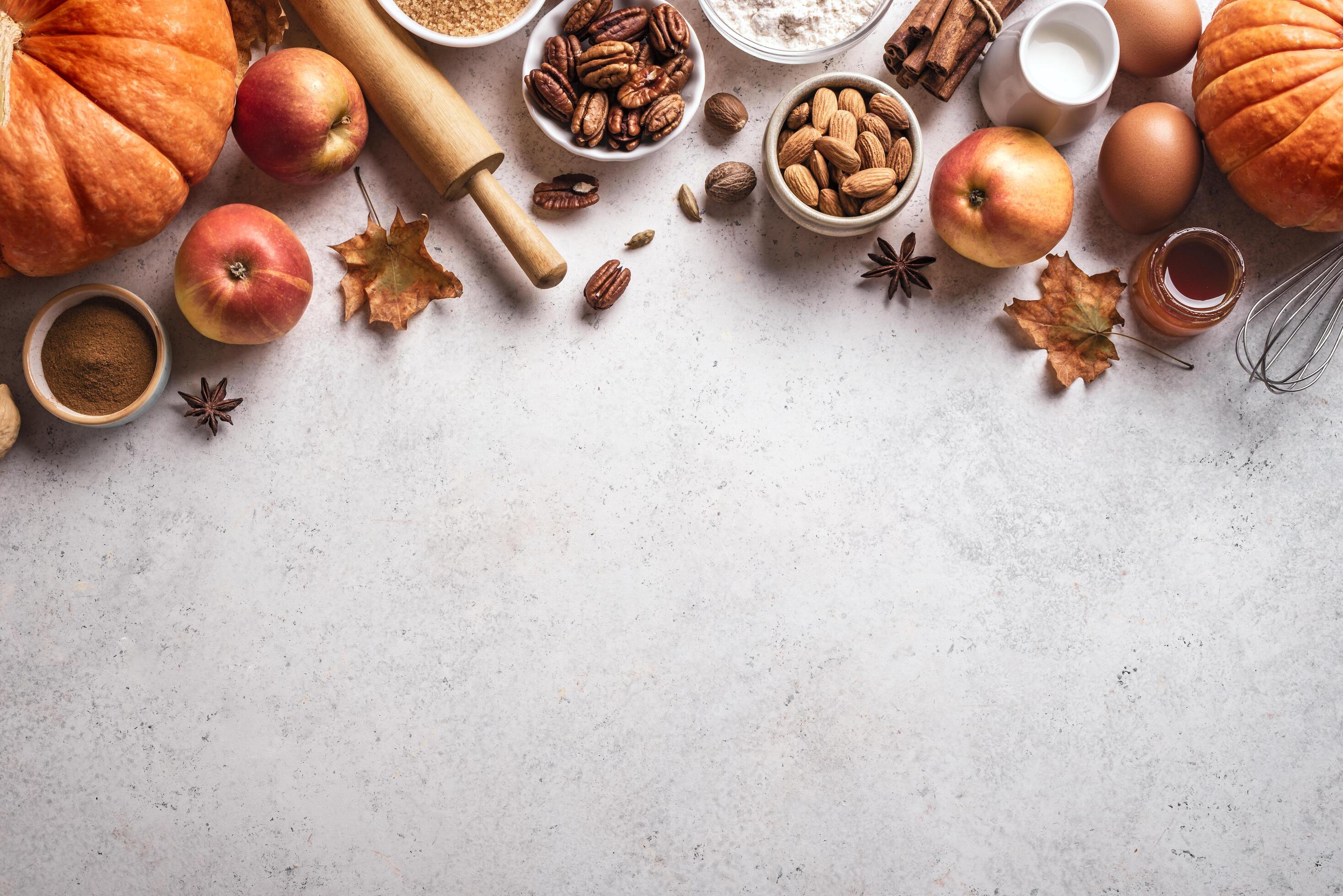 Autumn baking background with pumpkins, apples and nuts Stock Free