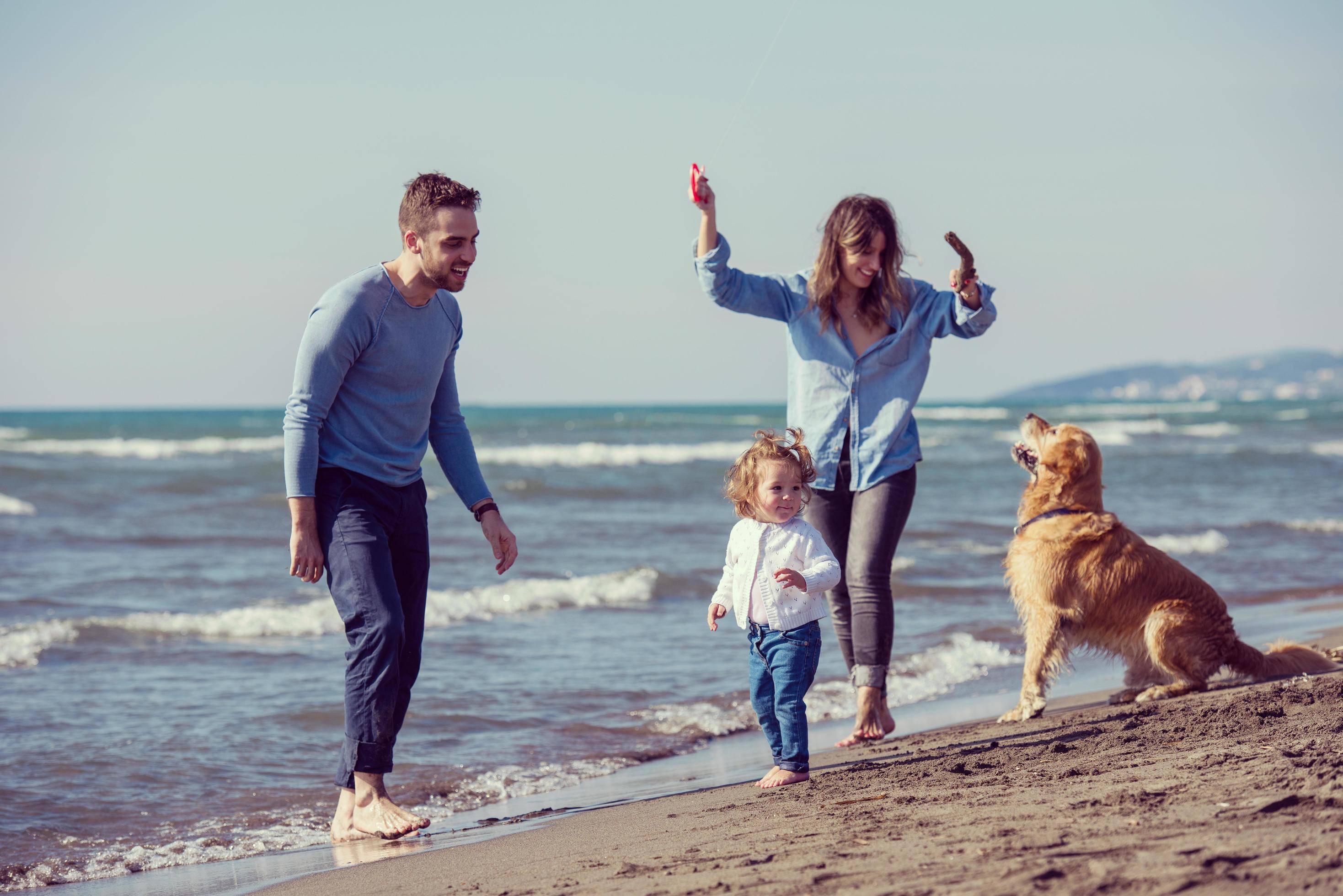 happy young family enjoying vecation during autumn day Stock Free