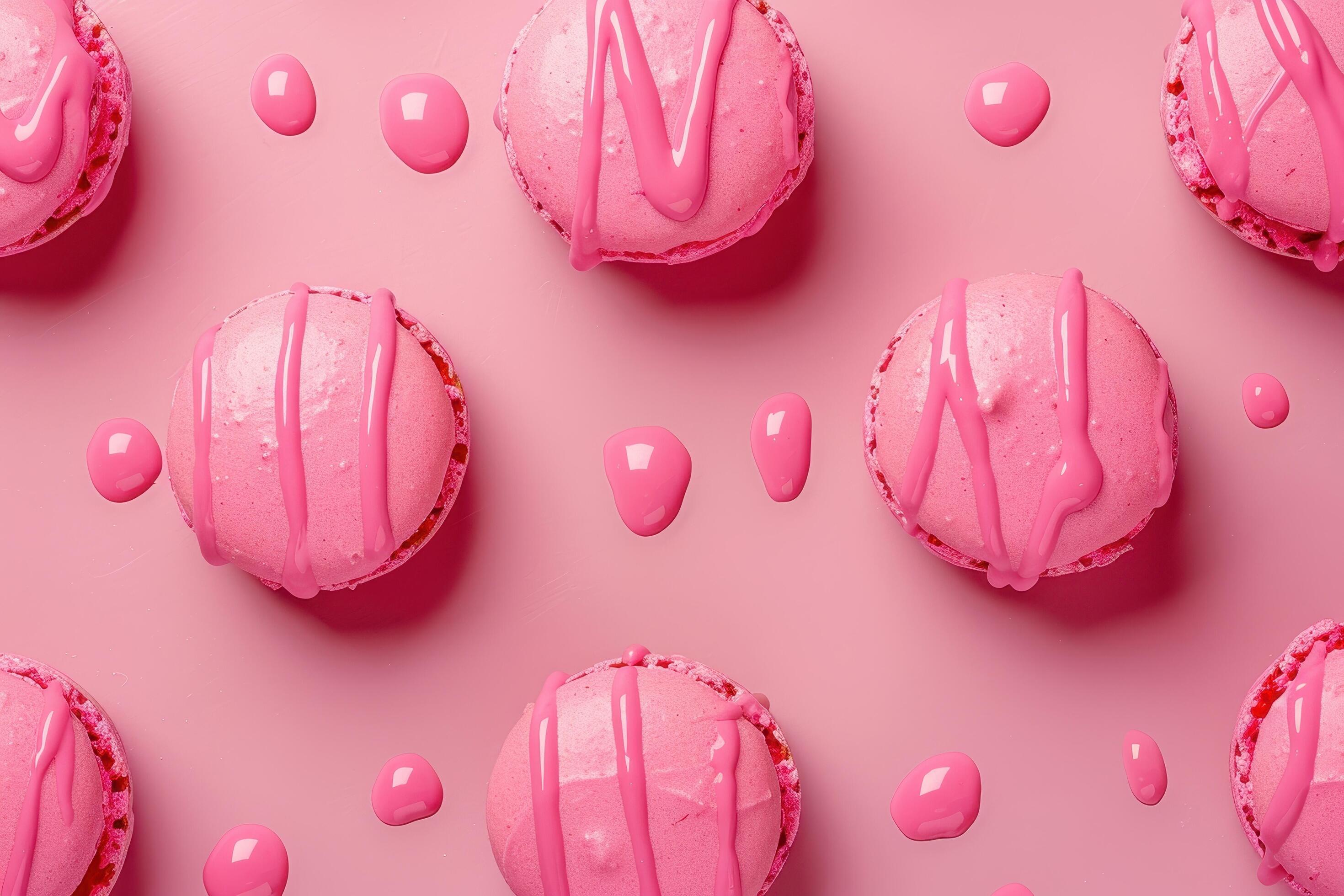 Pink Macarons with Drizzled Glaze and Drops on Pink Background Stock Free