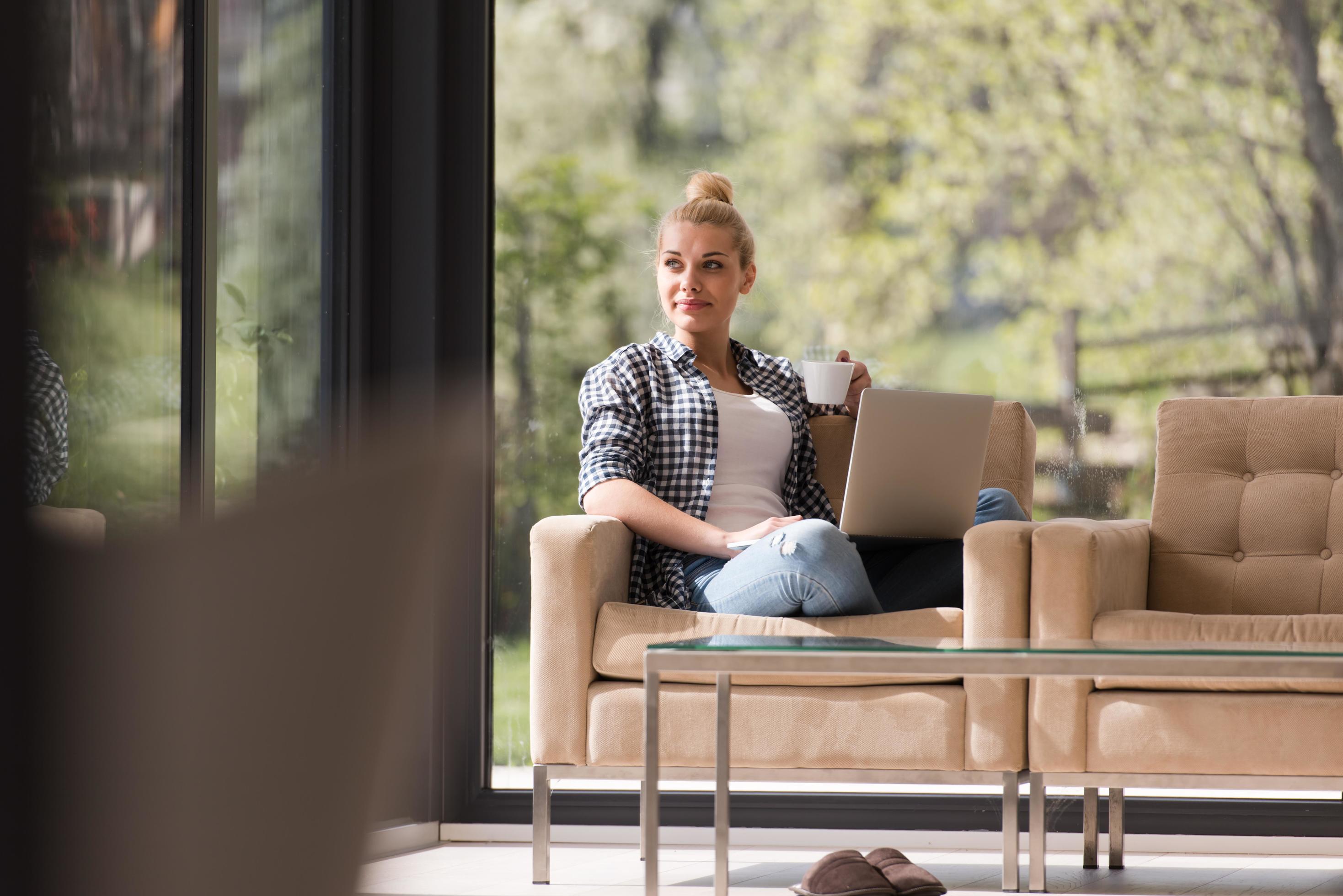 woman drinking coffee enjoying relaxing lifestyle Stock Free