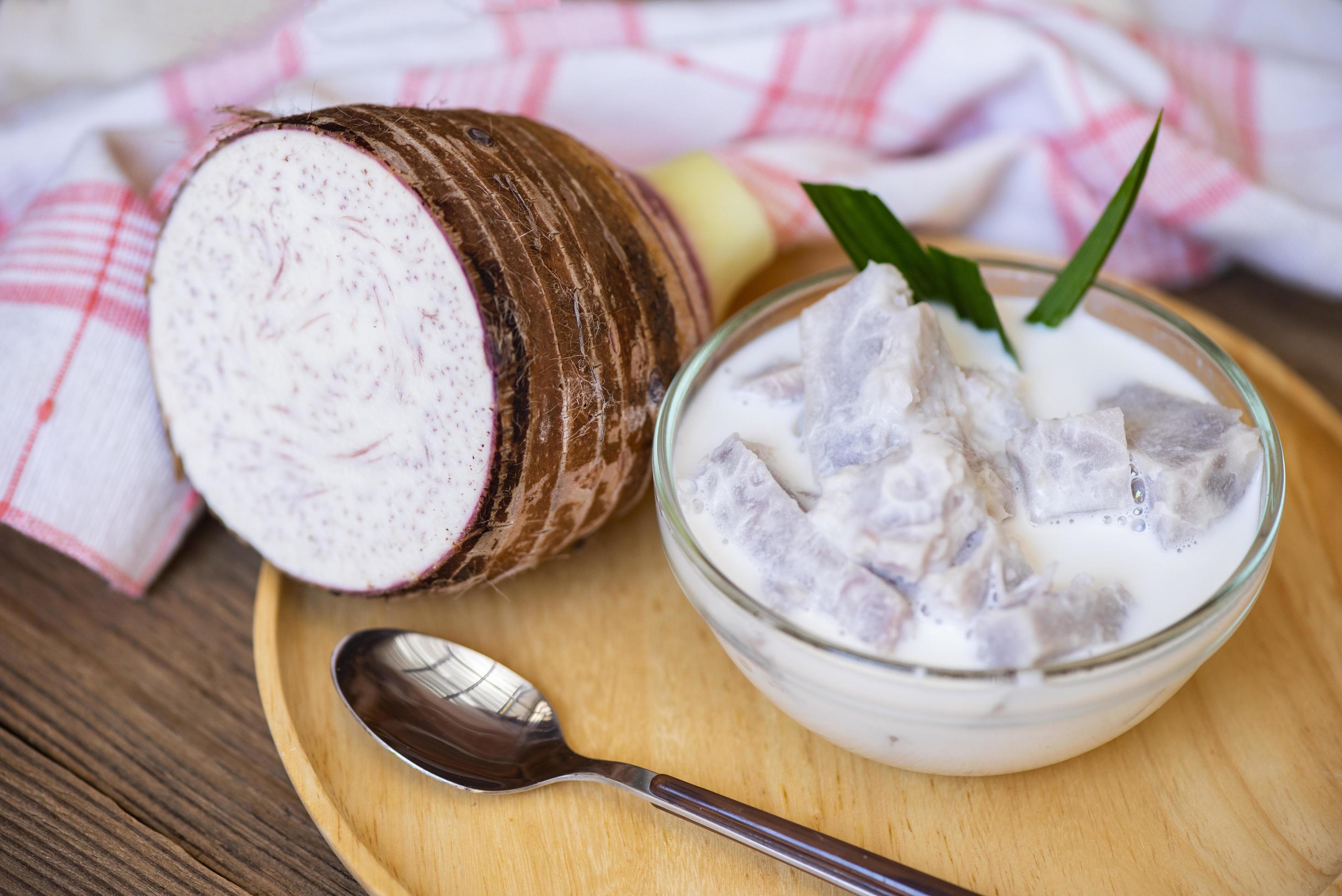 Taro food with dessert taro boiled with sugar and coconut milk on bowl and fresh raw organic taro root ready to cook, Asian Thai food Stock Free