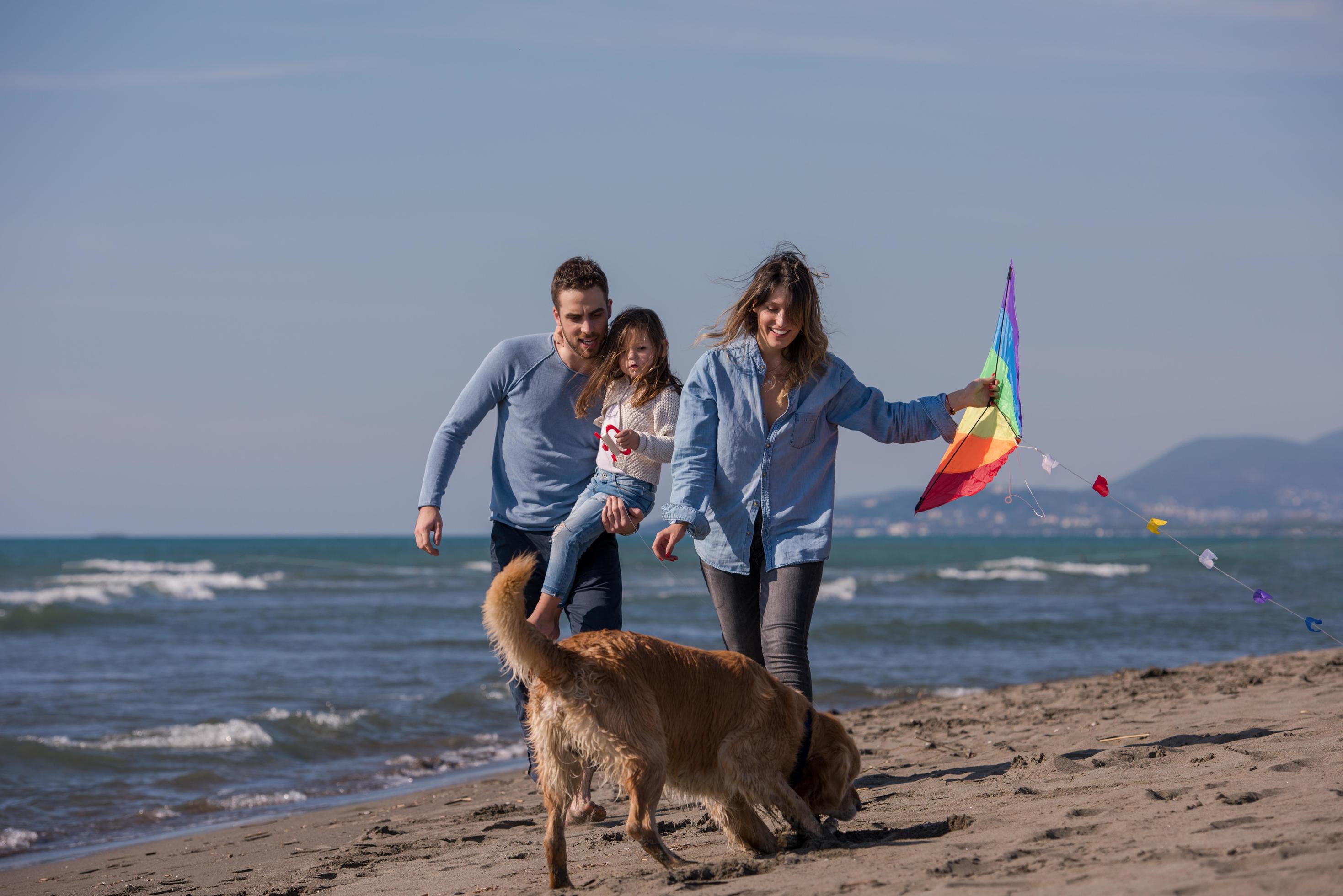 happy young family enjoying vecation during autumn day Stock Free