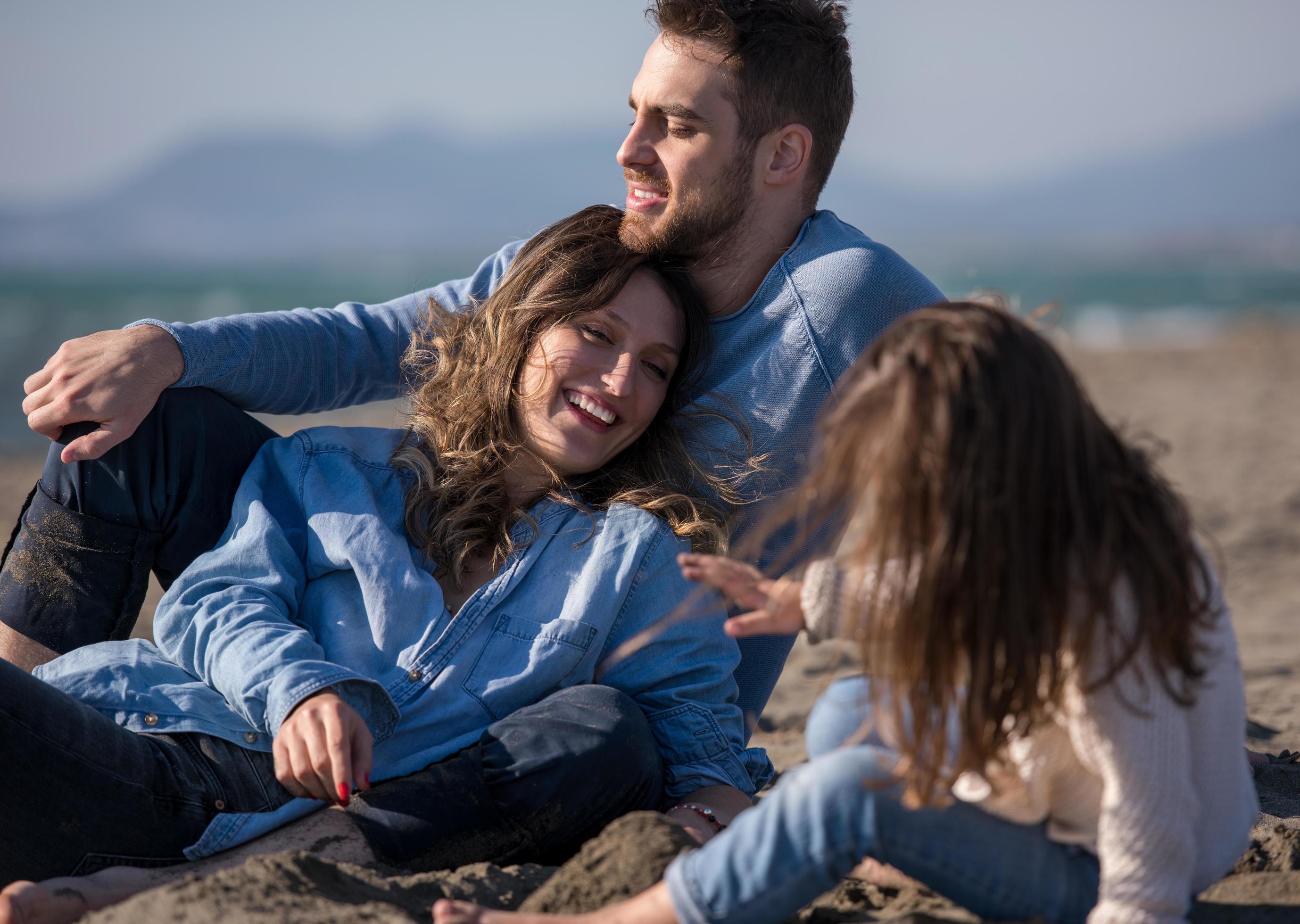 Young family enjoying vecation during autumn Stock Free