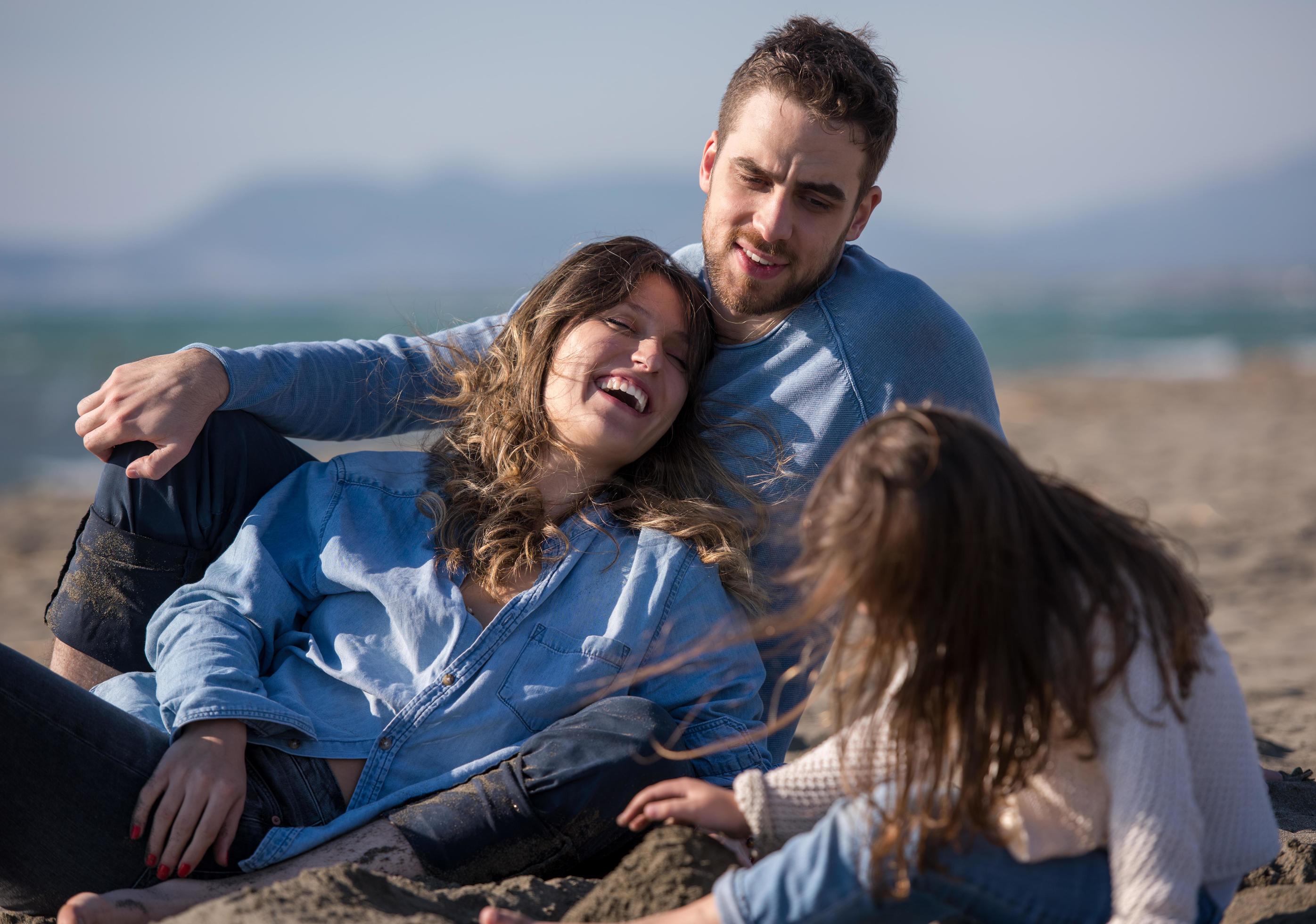 Young family enjoying vecation during autumn Stock Free