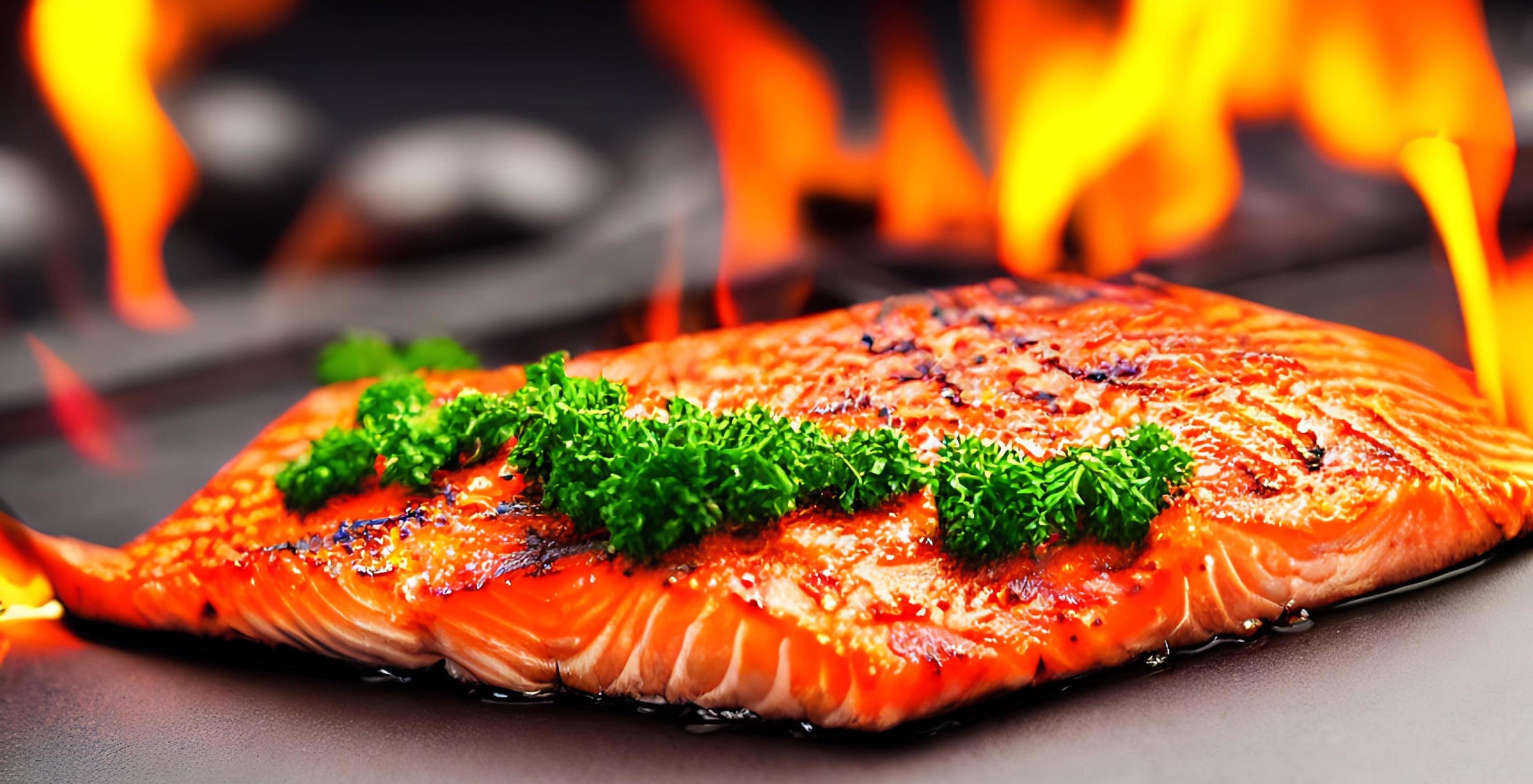 Grilled salmon. Healthy food baked salmon. Hot fish dish. Stock Free