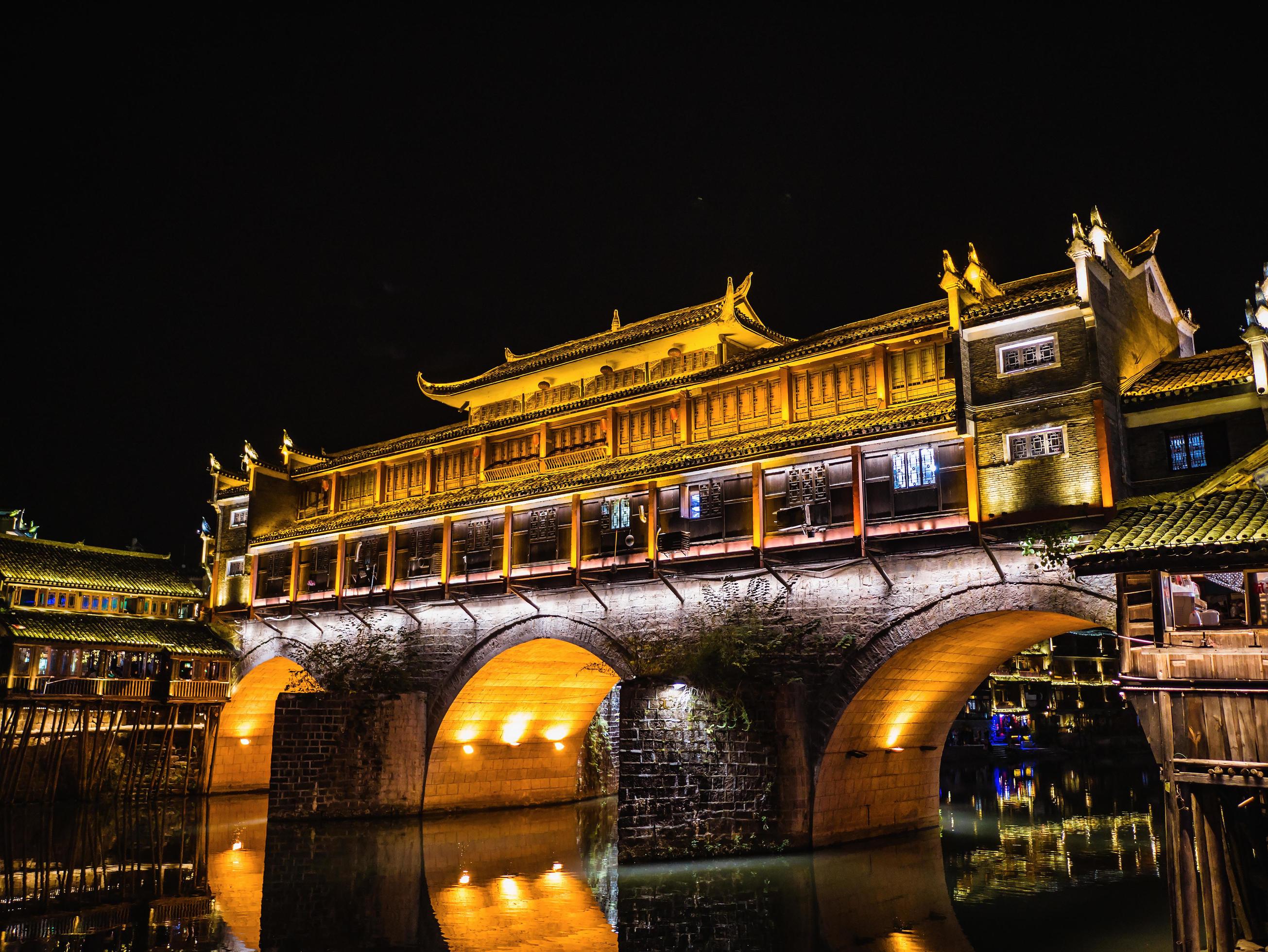 Scenery view in the night of fenghuang old town .phoenix ancient town or Fenghuang County is a county of Hunan Province, China Stock Free