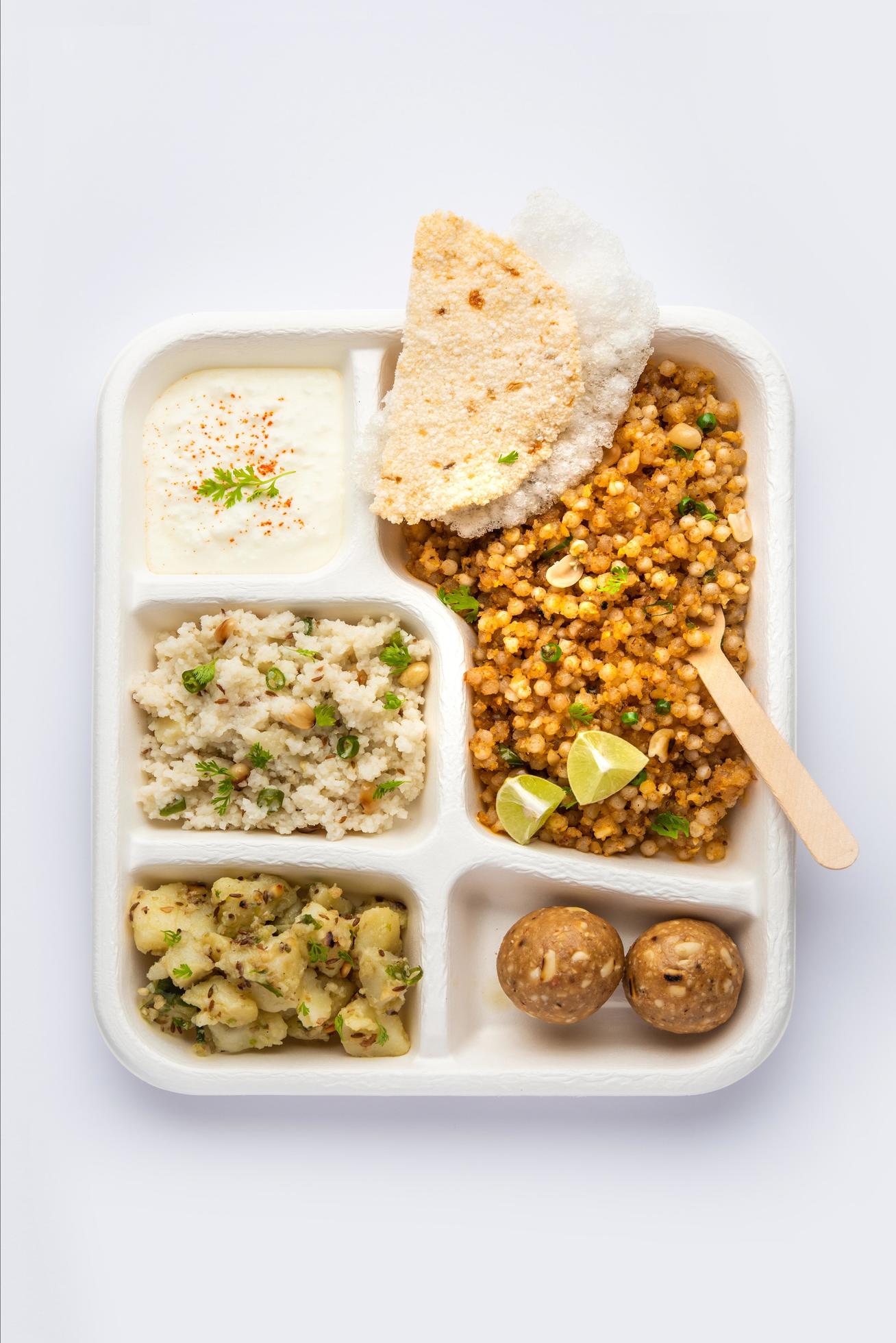 Indian Upwas thali, fasting food platter or thali for home delivery or takeaway parcel for any Vrat Stock Free