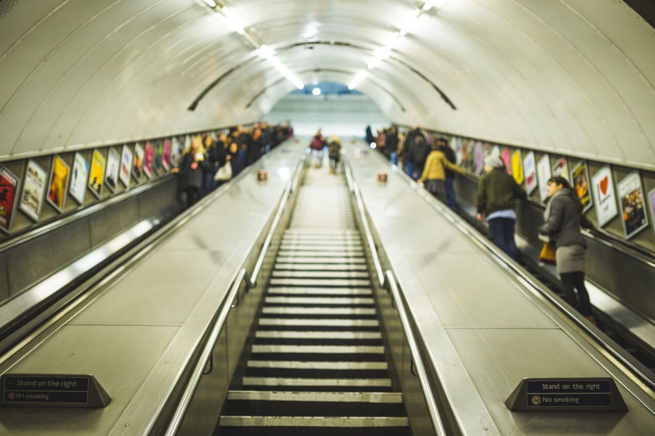 Commuters on Escalator Stock Free