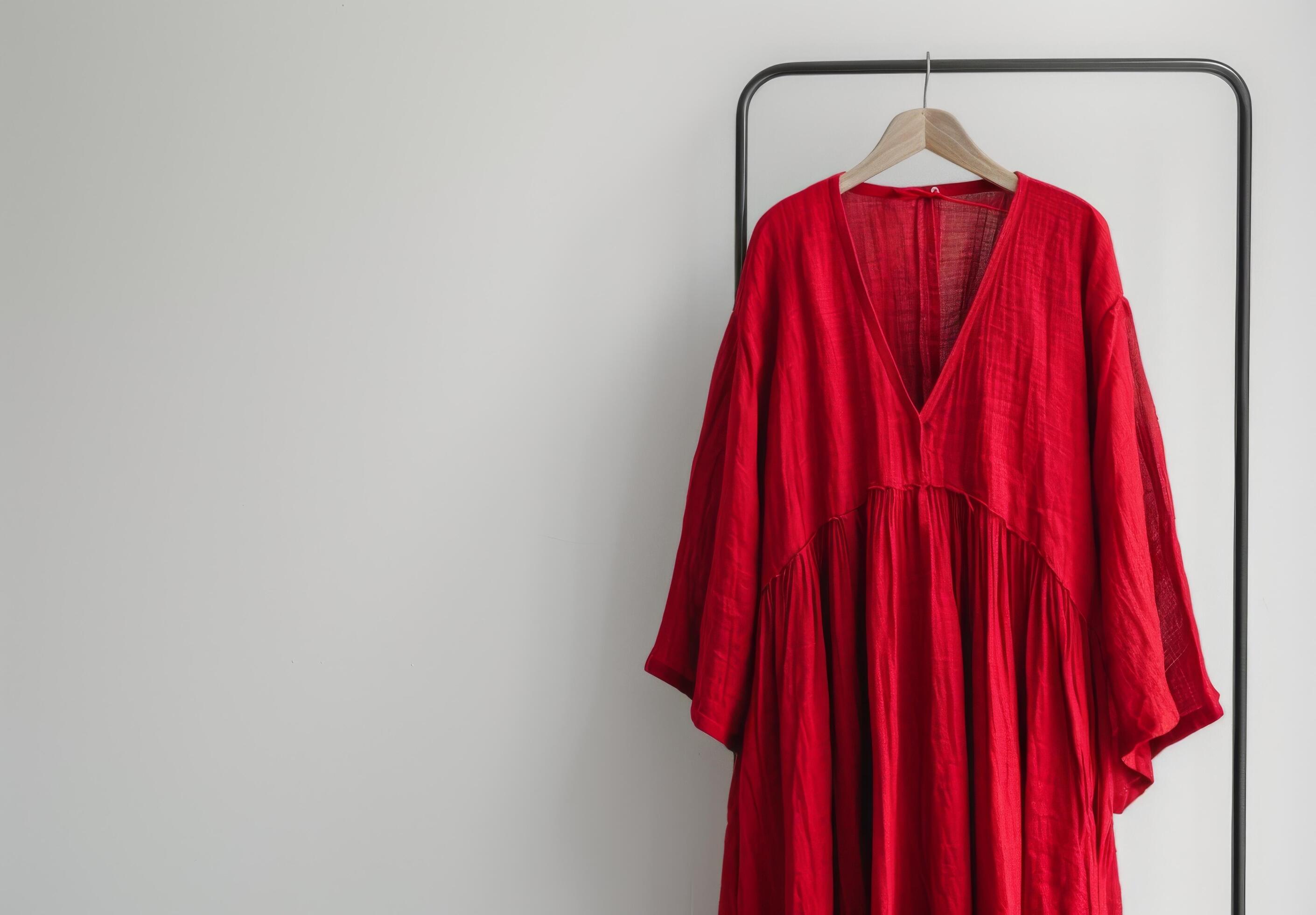 Red Kimono Robe Hanging On Clothes Rack Stock Free