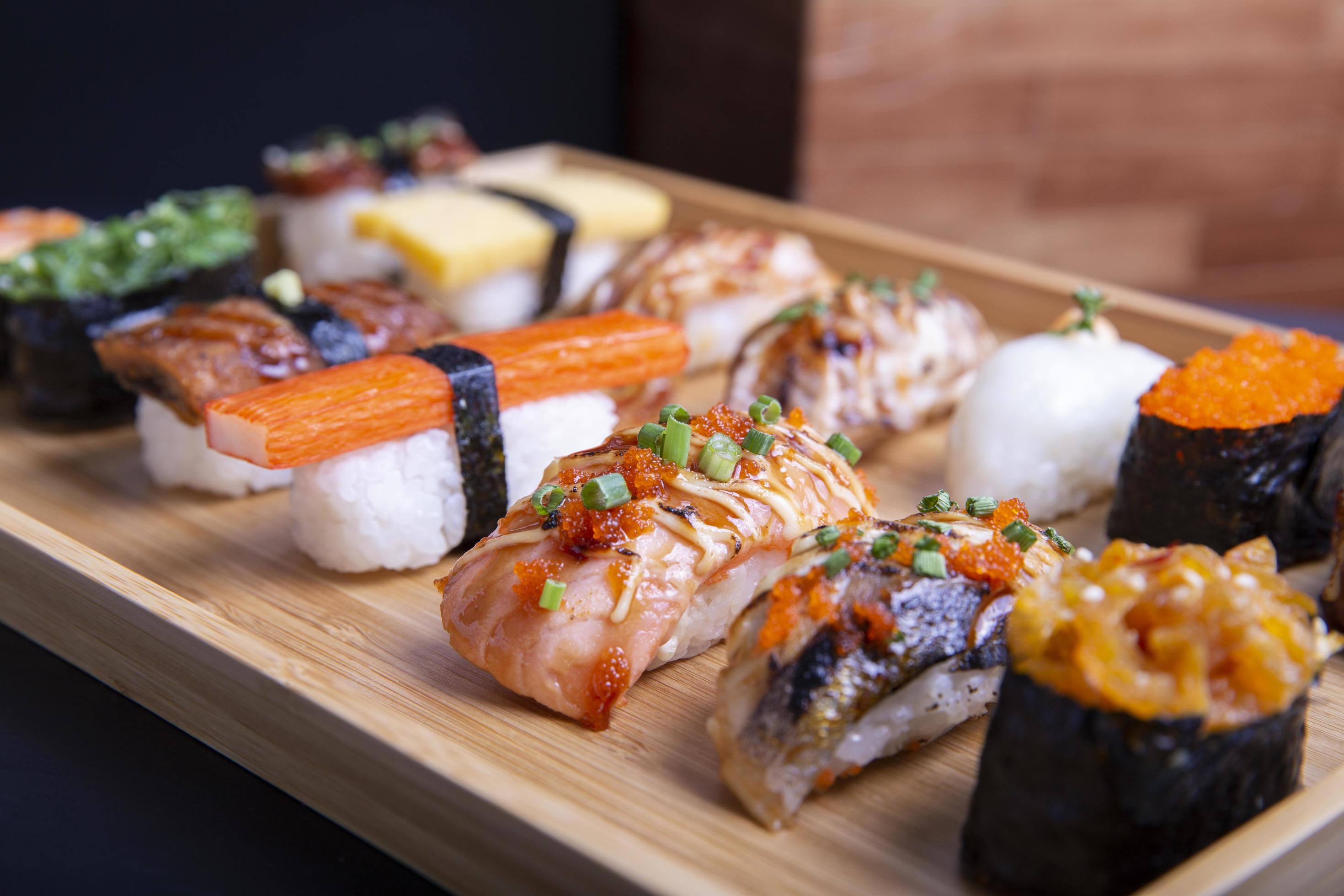 Japanese sushi set , Sushi nigiri rolls and sashimi served in japanese food restaurant menu Stock Free