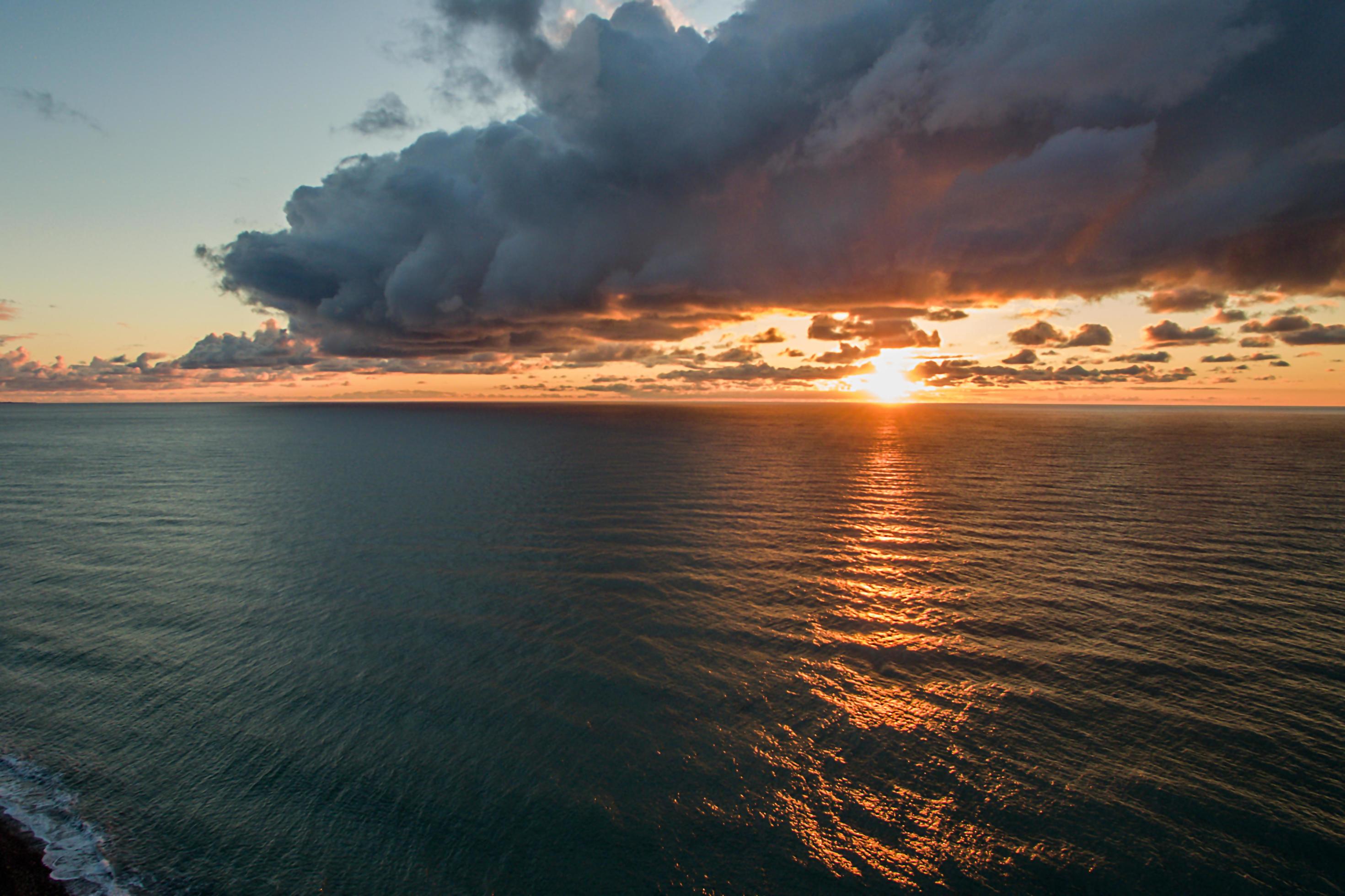 Aerial view of the sea landscape with a beautiful sunset Stock Free