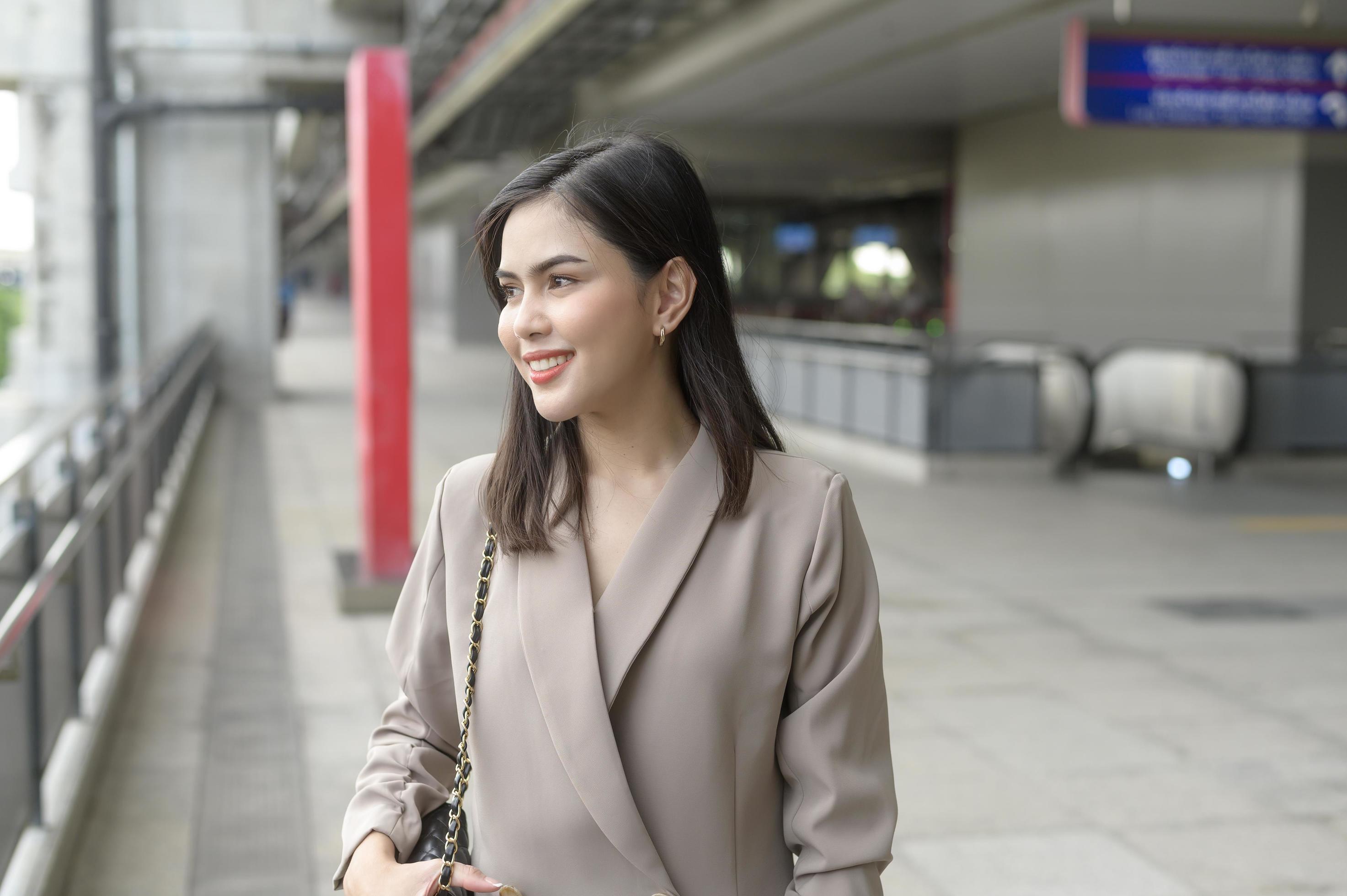 A portrait of beautiful smiling Businesswoman in modern City , people lifestyle concept Stock Free