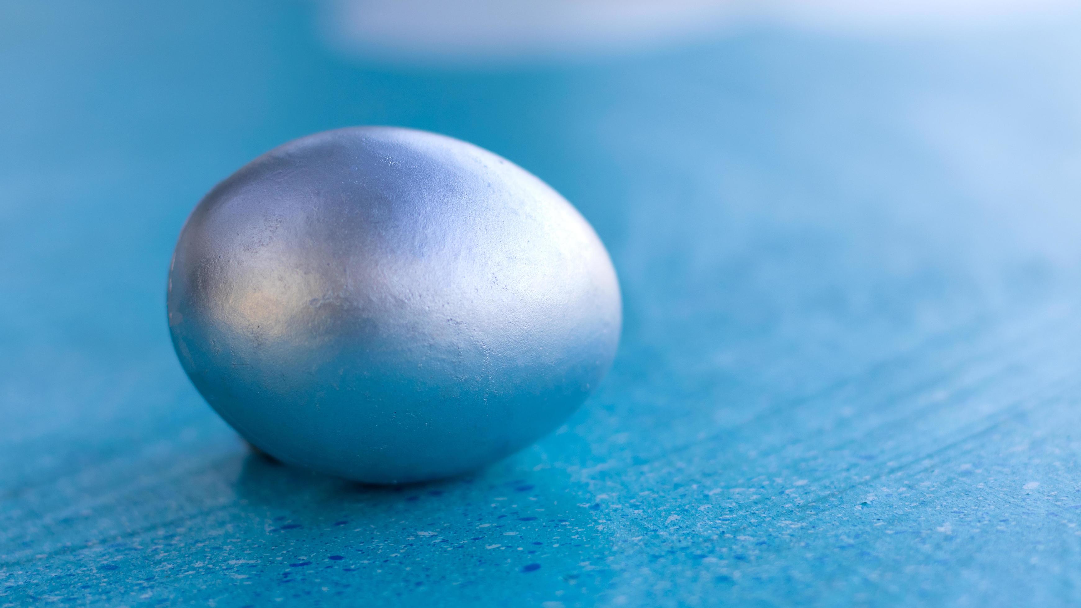 Silver eggs on a white background for Easter. Stock Free