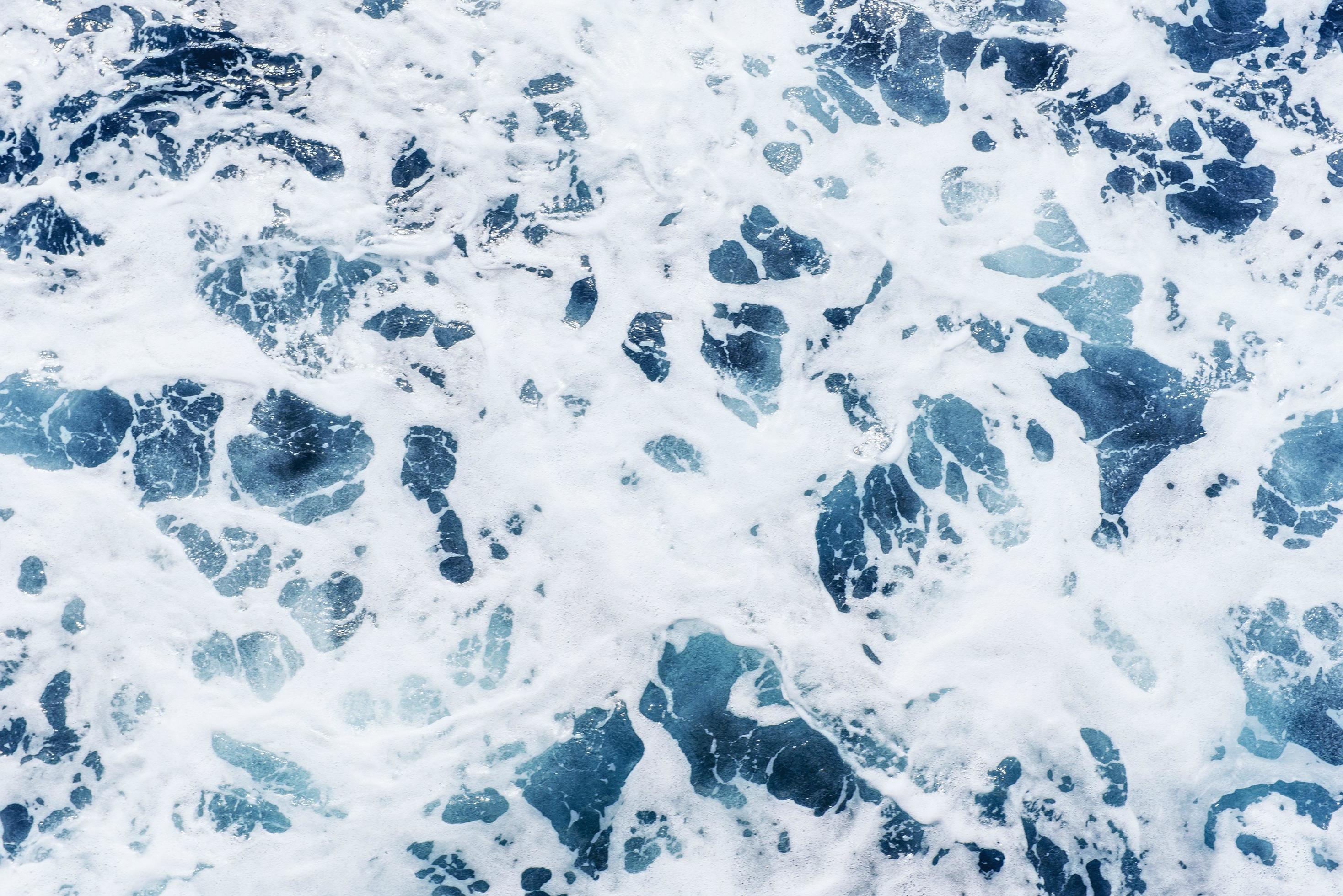 Background blue waves of the sea Stock Free