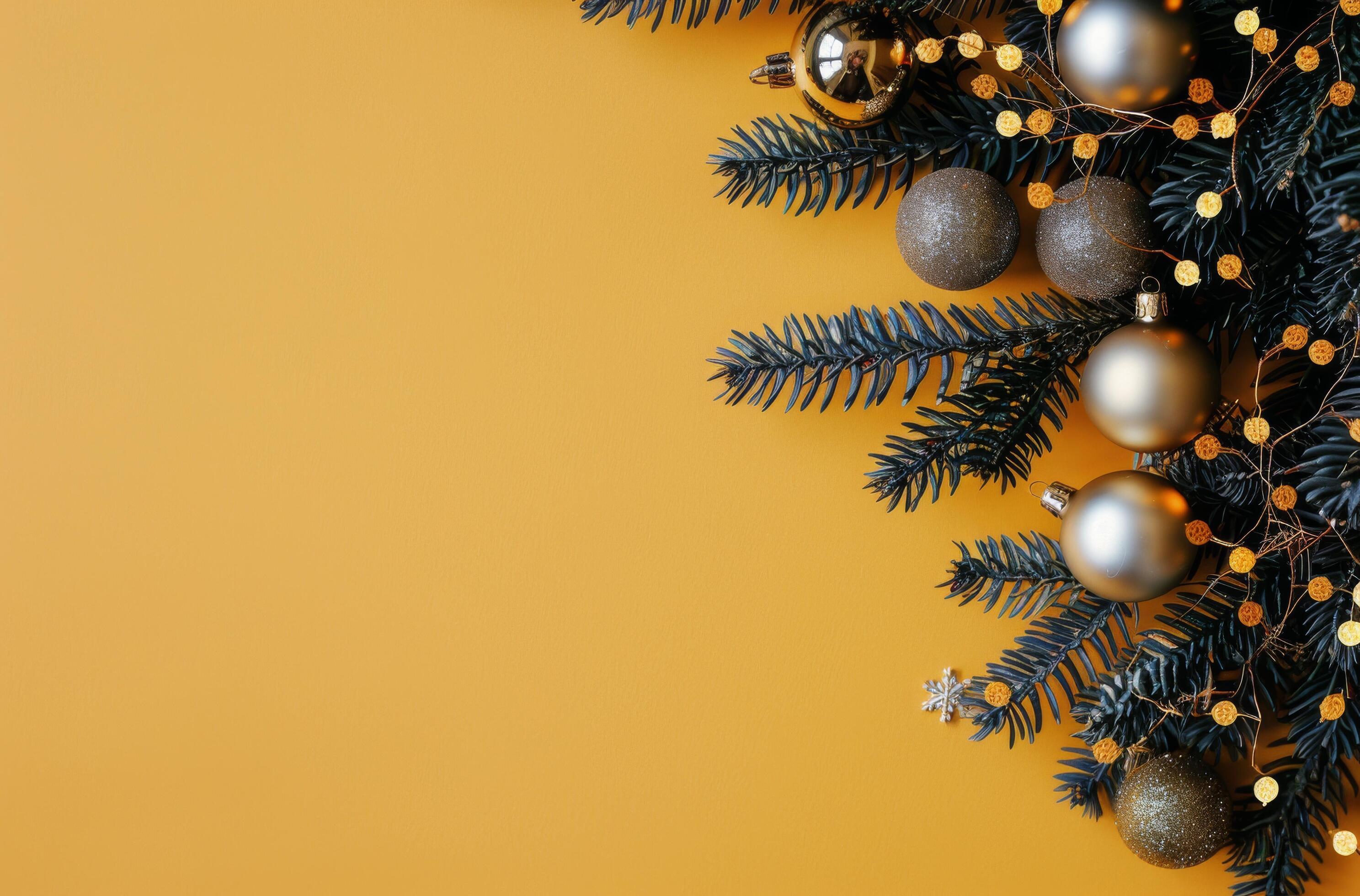 Pine Branch With Ornaments on Yellow Background Stock Free