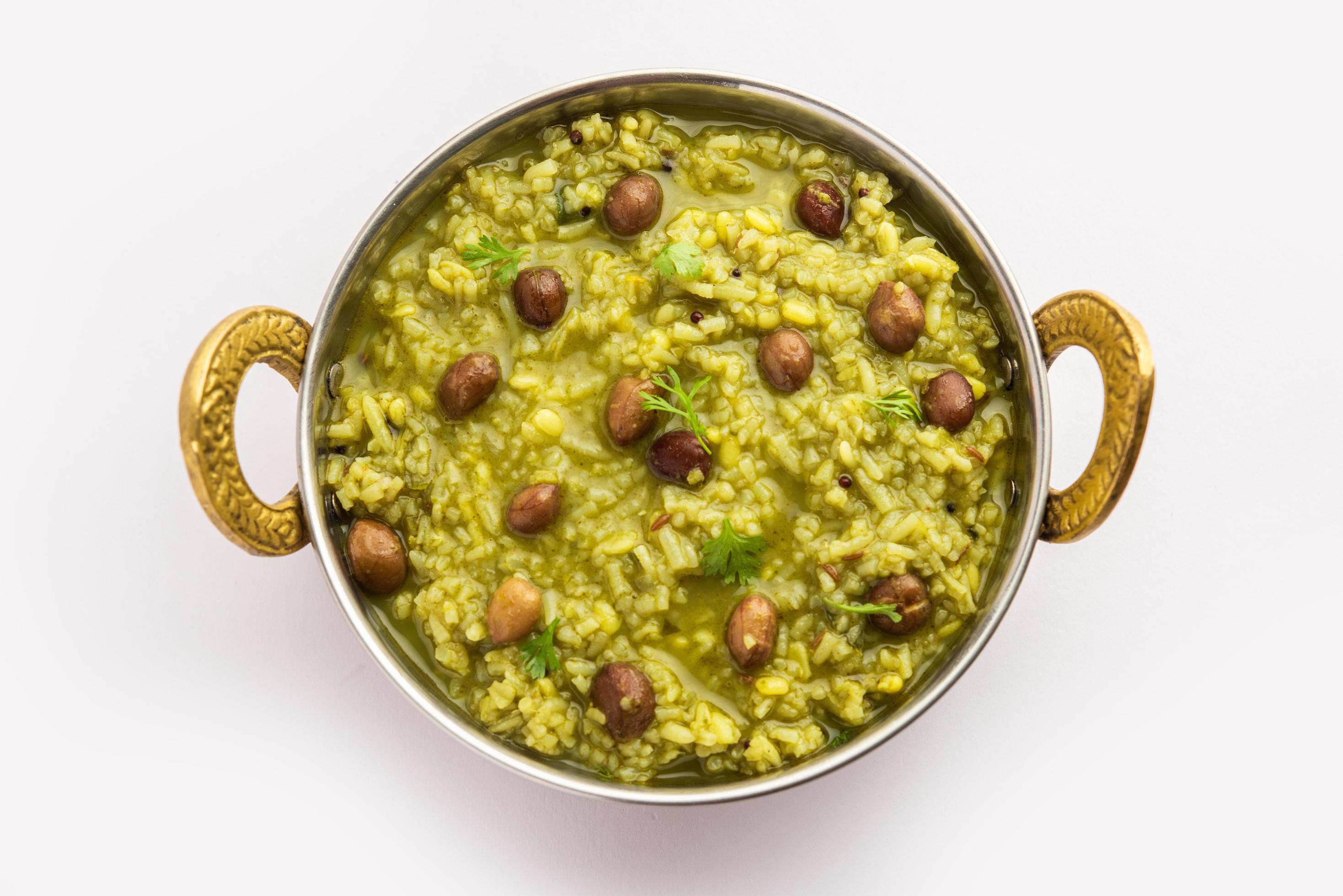 Palak khichdi is a one pot nutritious meal of mung lentils and rice with spinach, Indian food Stock Free