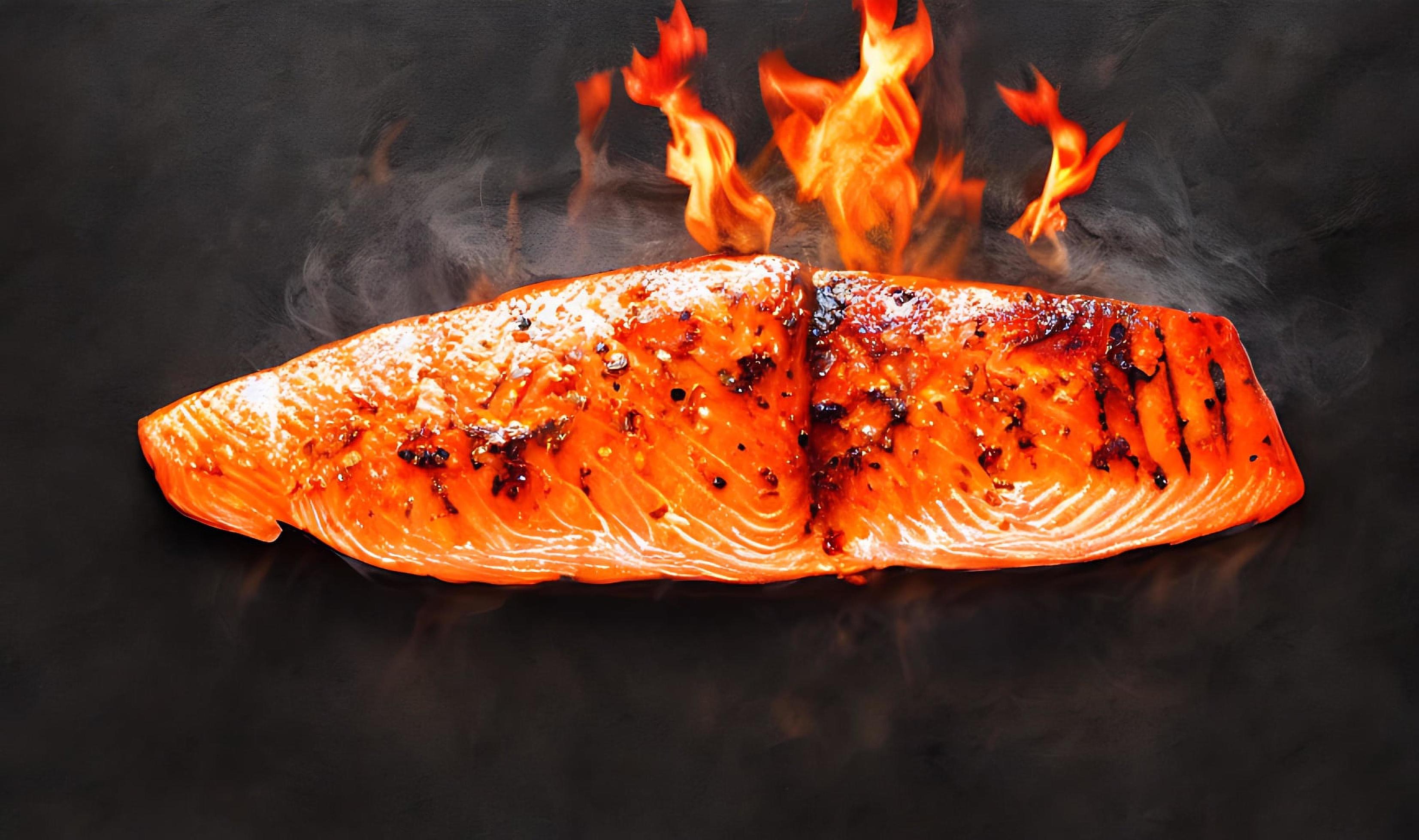 Grilled salmon. Healthy food baked salmon. Hot fish dish. Stock Free