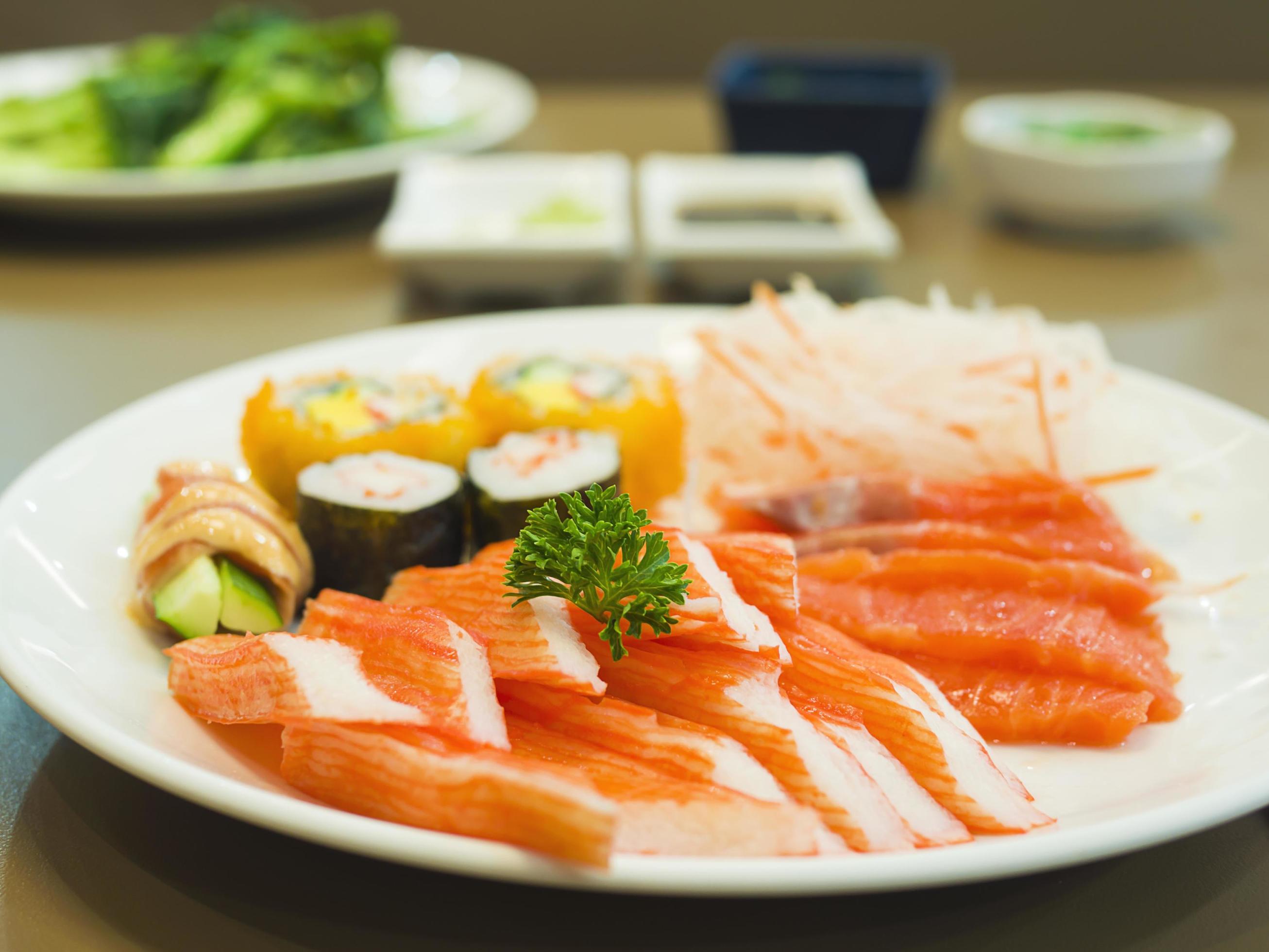 Fresh colorful Japanese food on the white plate, selective focused Stock Free