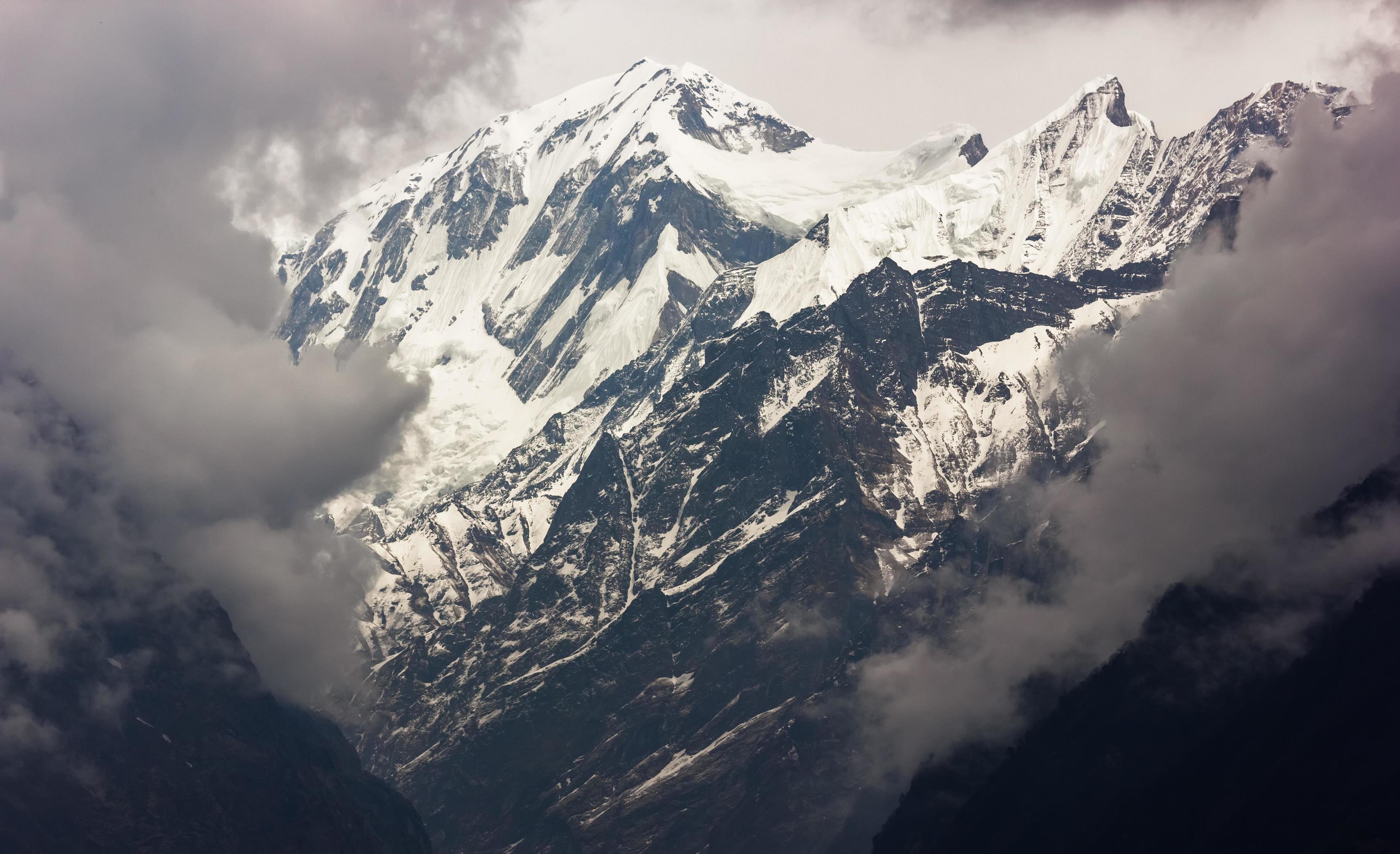 A view of the Annapurna range from the village of Chhomong on the Annapurna Base Camp trail in the Nepal himalaya. Stock Free