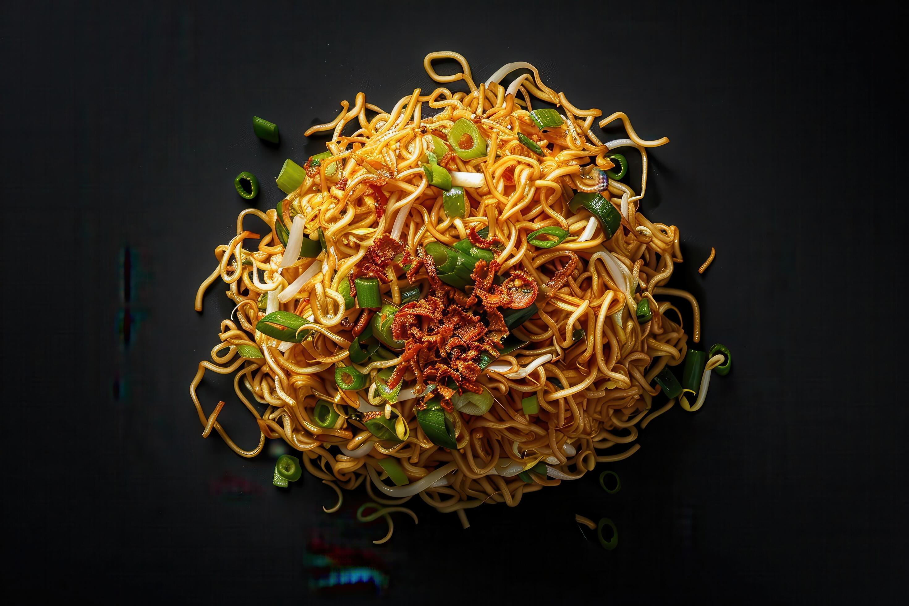 Close-up of Noodles with Green Onions and Toppings on a Black Background Stock Free