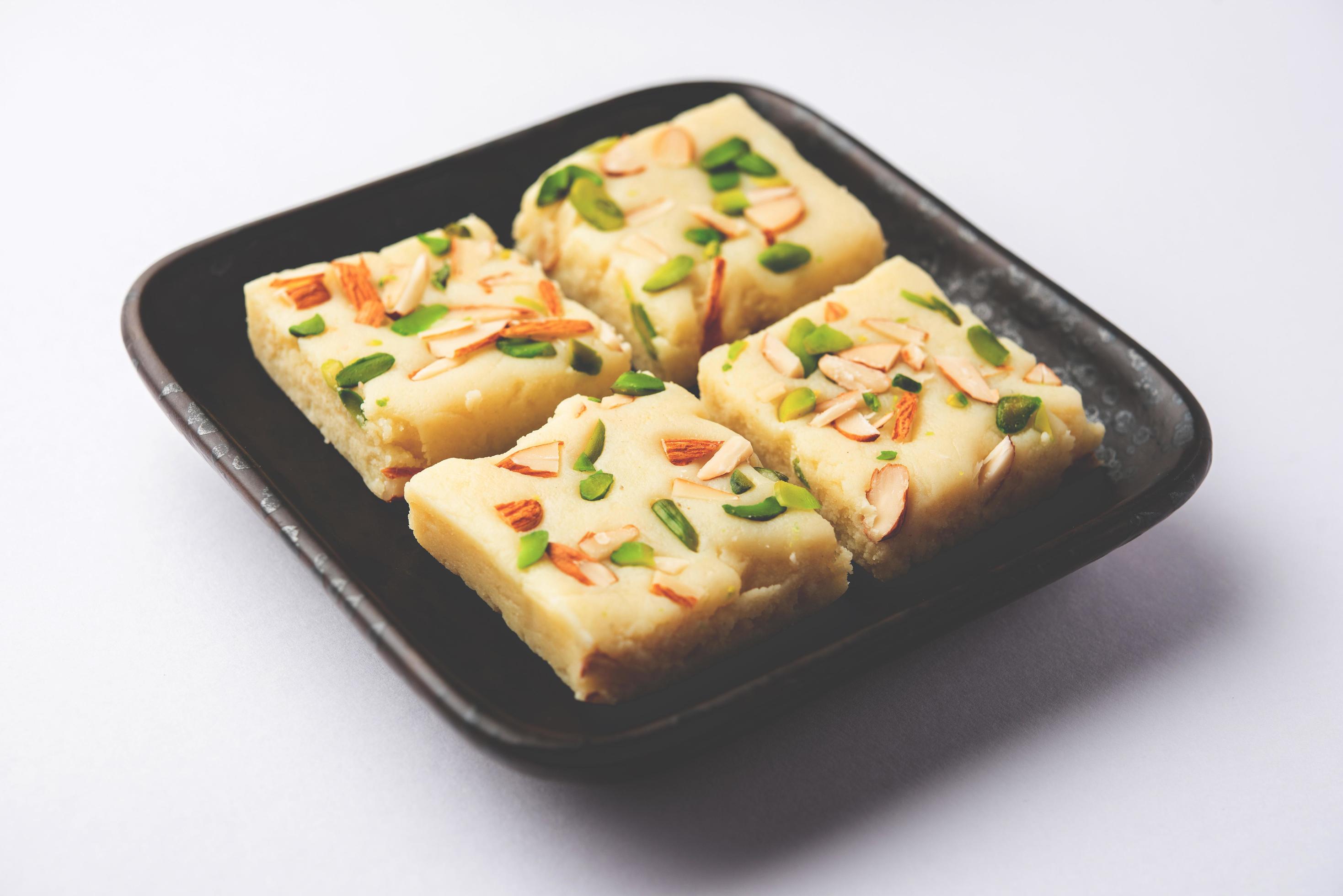 Milk powder barfi also known as Mava burfi, white Khoya burfi or Barfee, Indian Sweet food Stock Free