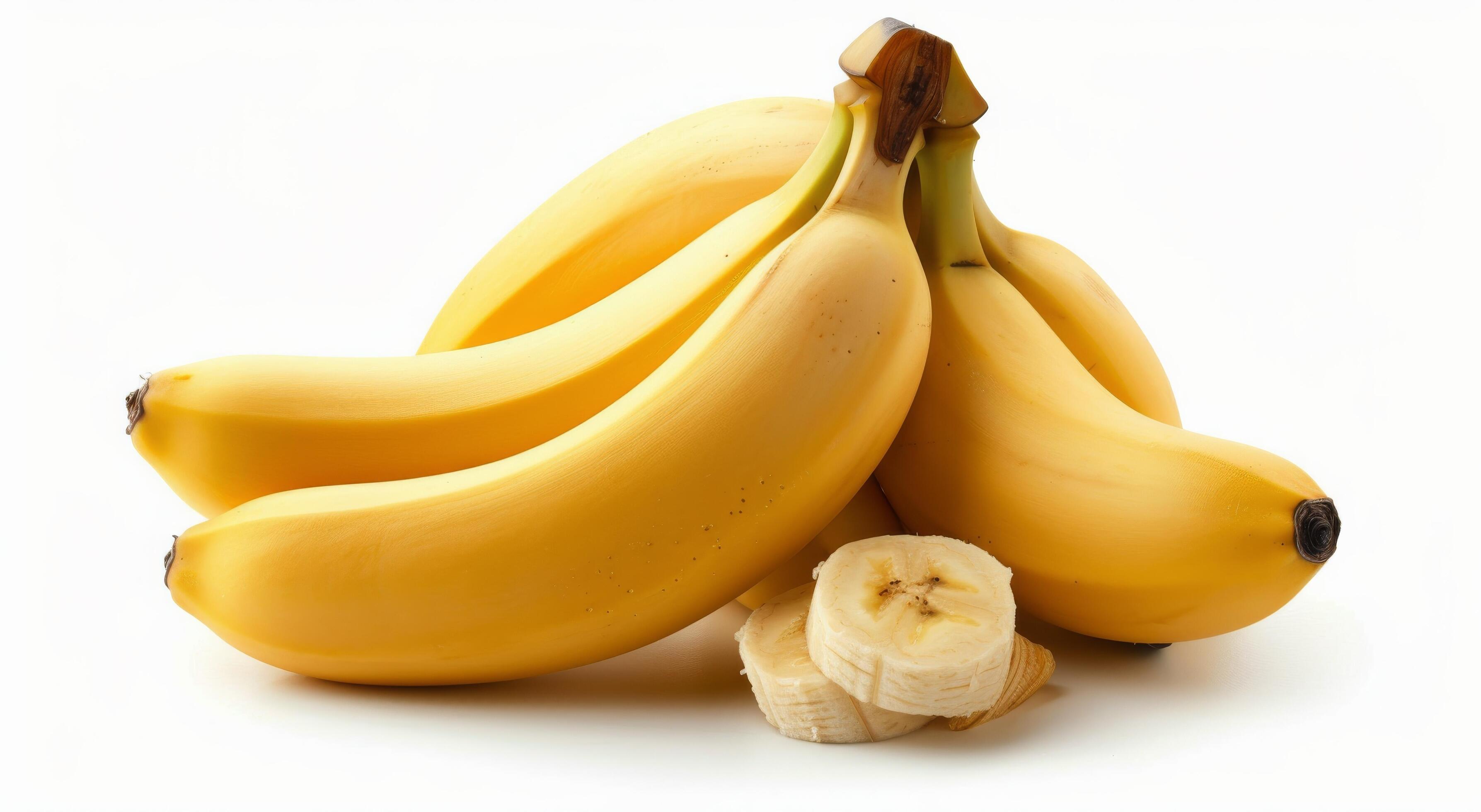 Yellow Bananas Stacked With Sliced Fruit Isolated on White Background Stock Free