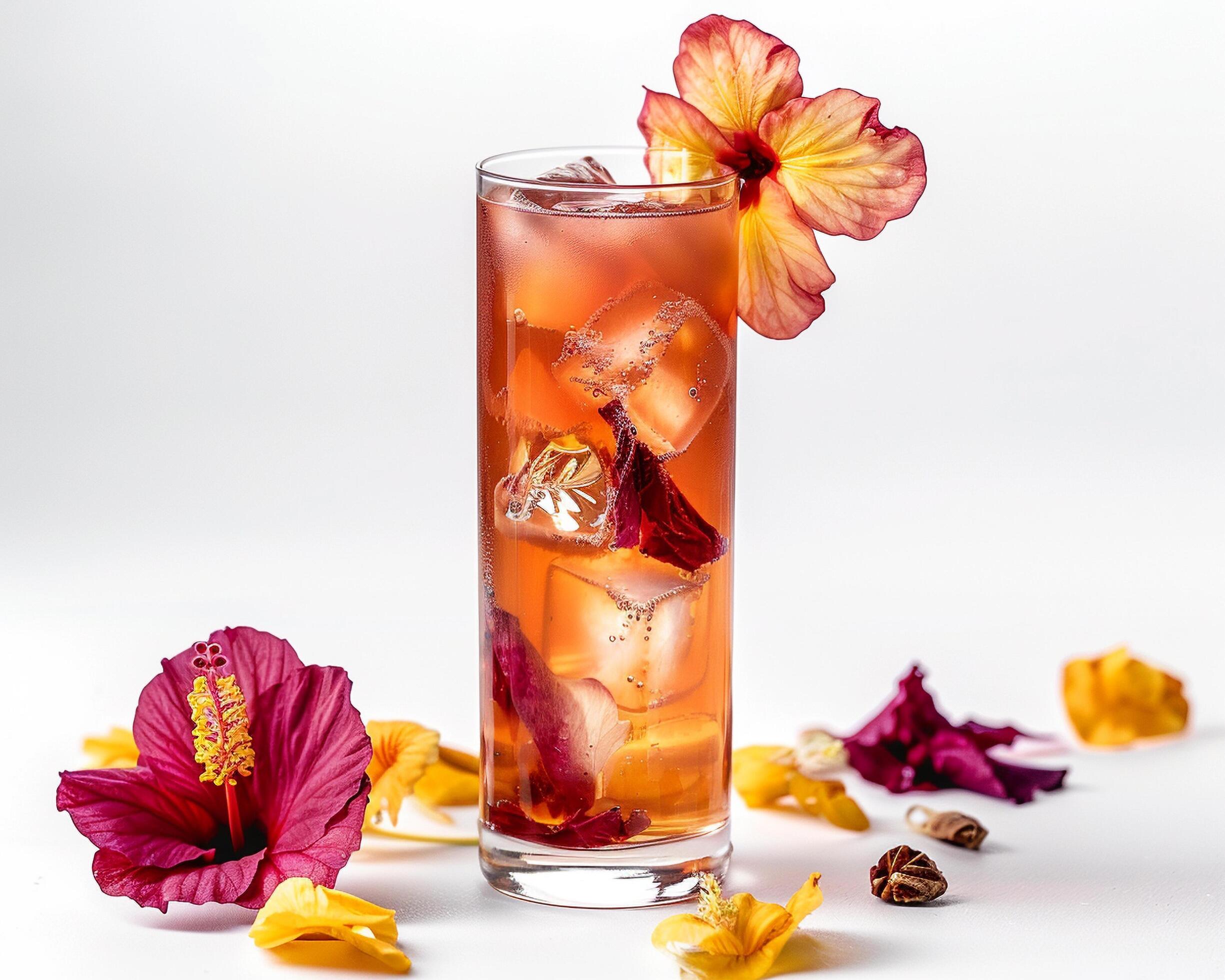 a glass of iced tea with flowers and ice Stock Free