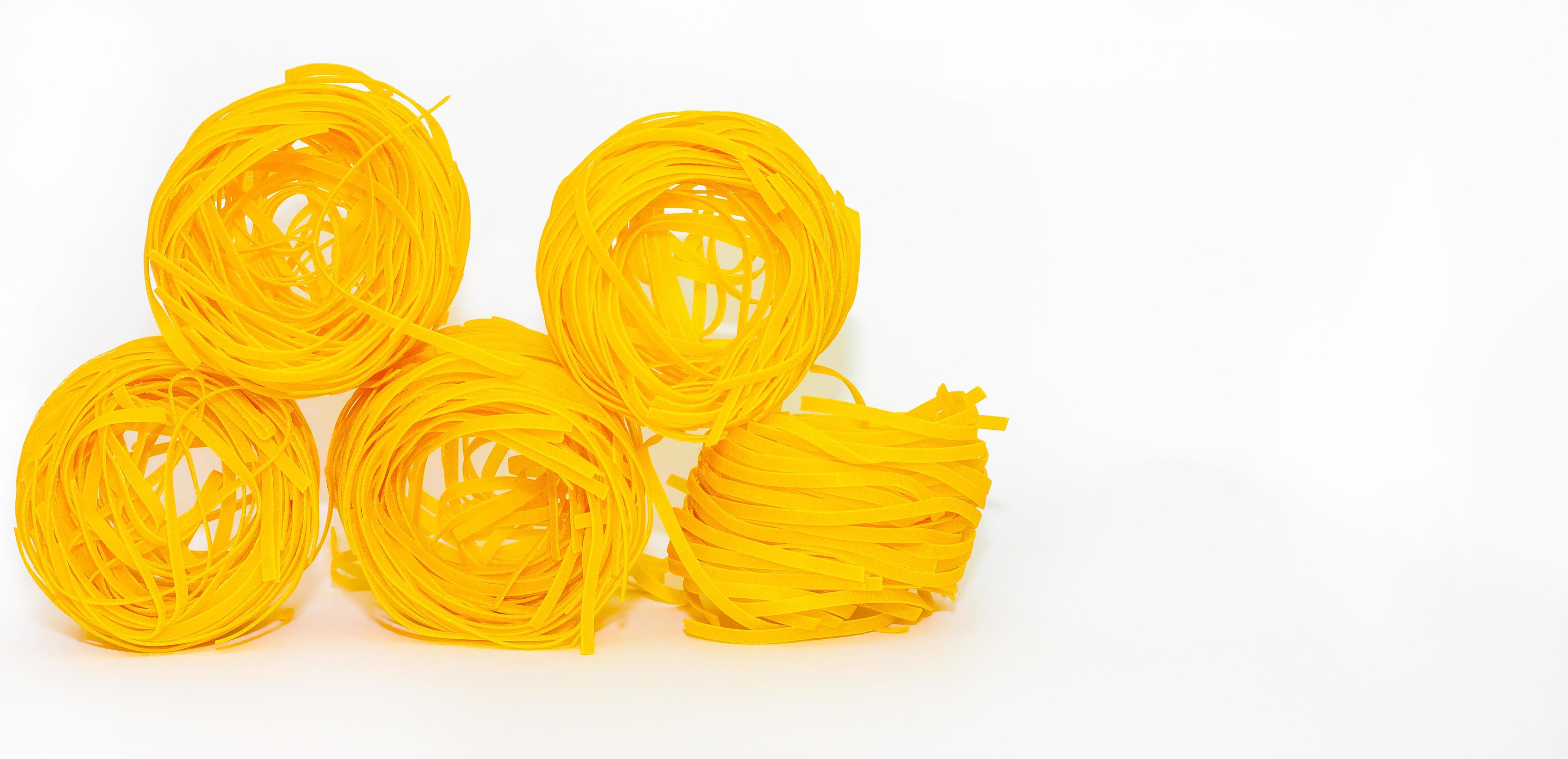 Italian egg pasta nest, great design for any purposes. Healthy vegetarian food. Italian lunch. Healthy diet. Stock Free