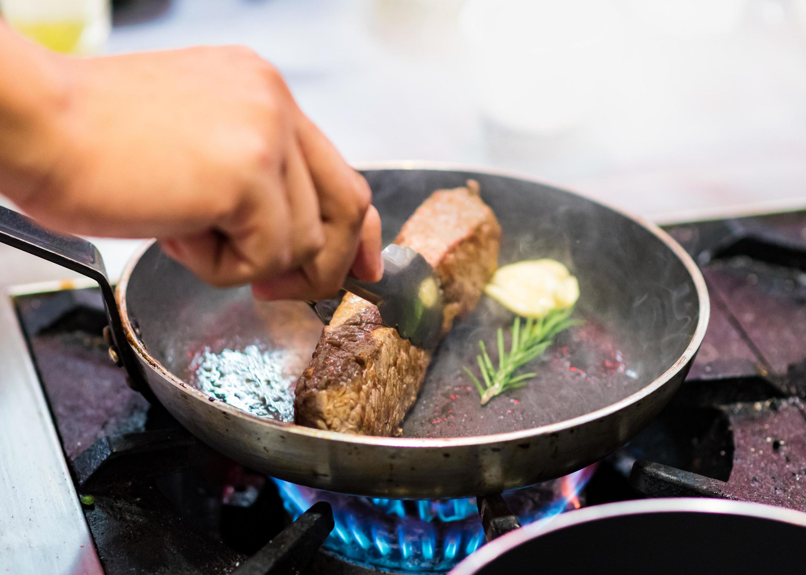 Chef cooking, Chef preparing food in the kitchen Stock Free