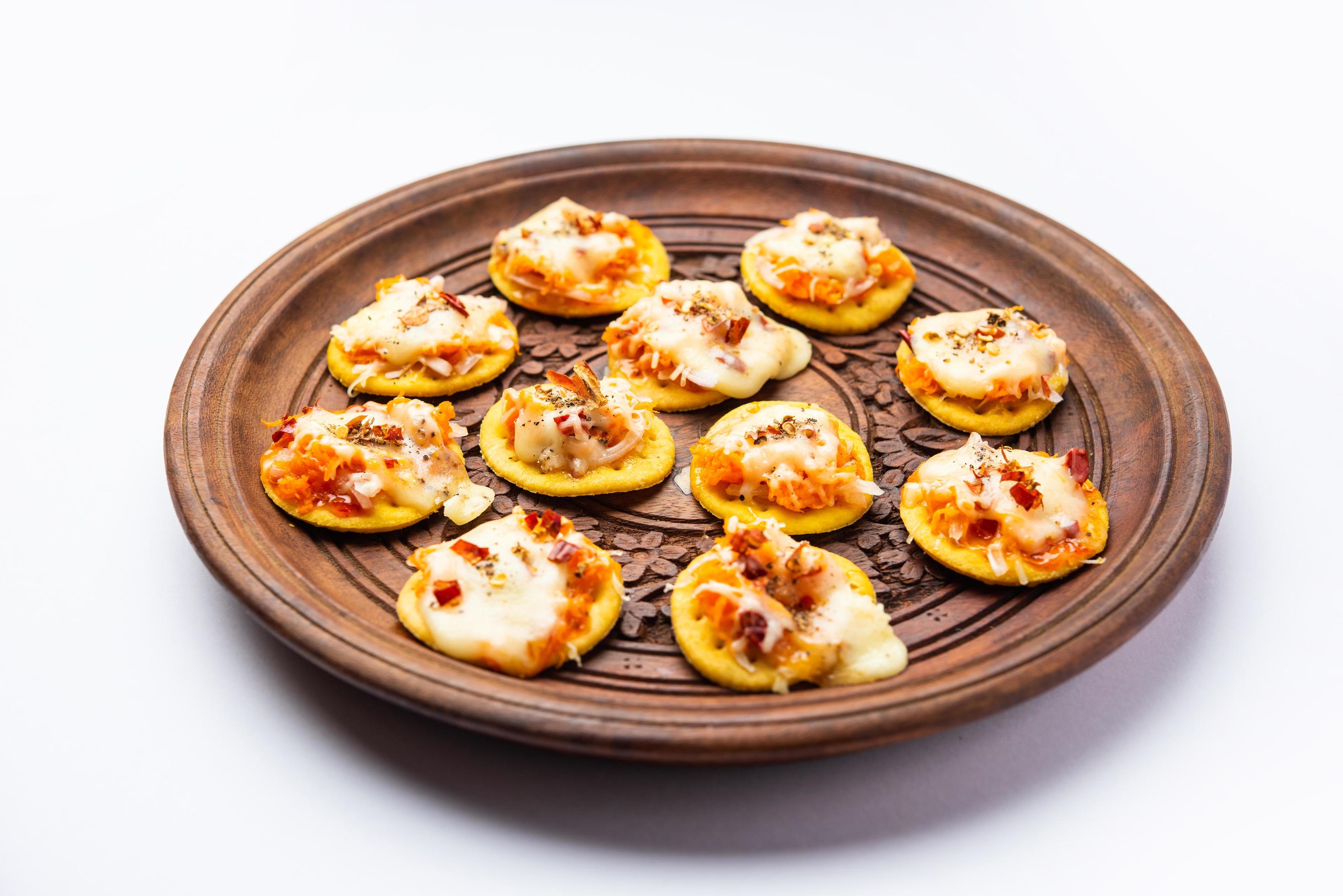 Papdi pizza are mini food bites, Indian kids favourite party snack Stock Free