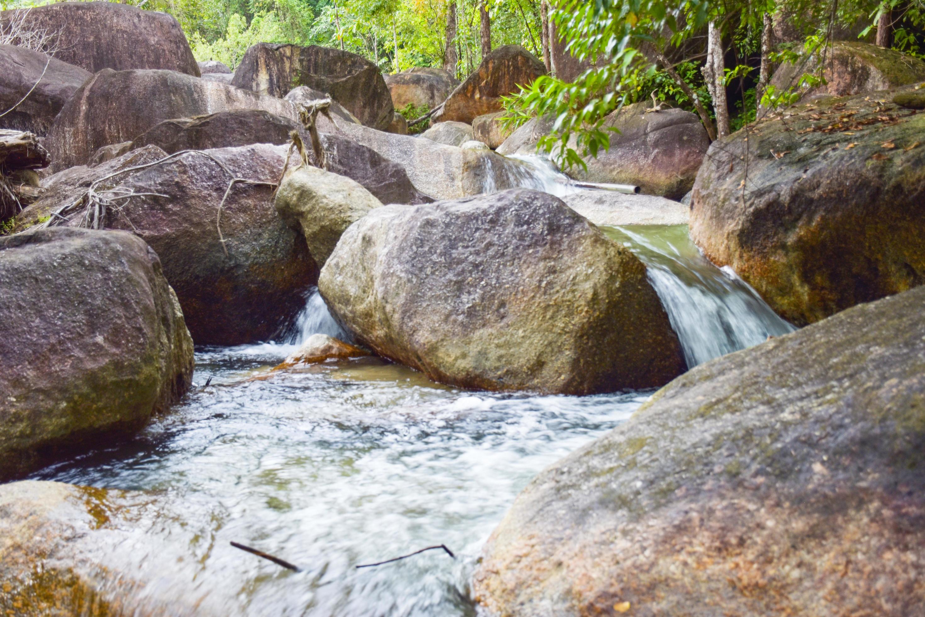 sunlight beauty nature and rock waterfall in south Thailand Stock Free