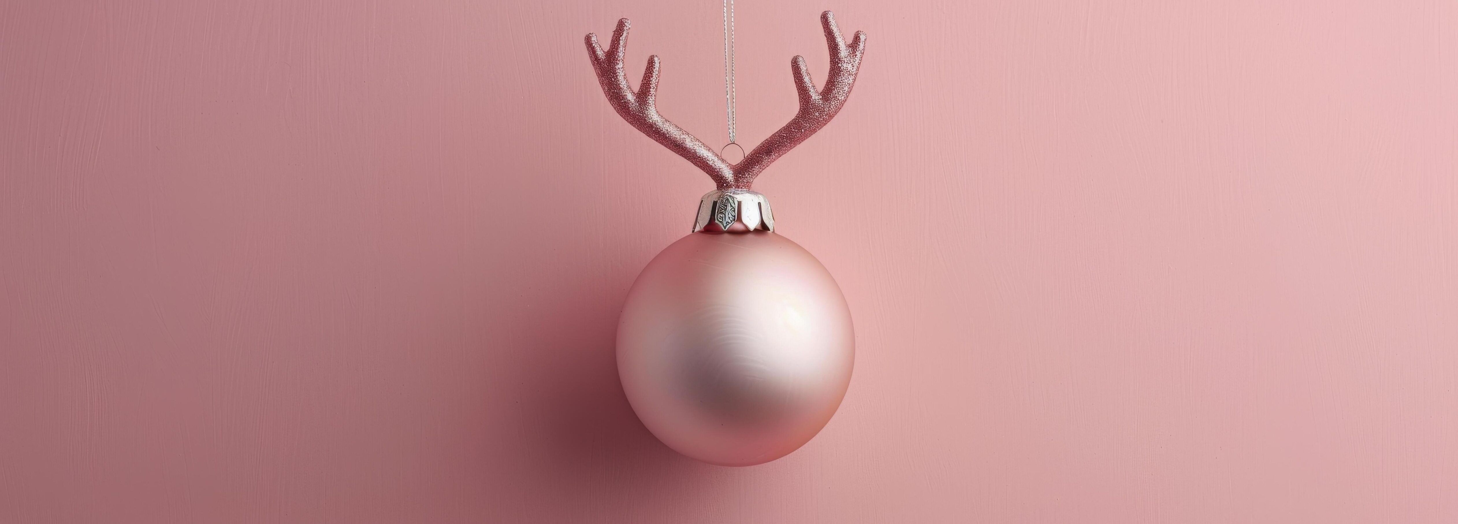 Pink Glitter Ornament With Antlers on Pink Background Stock Free