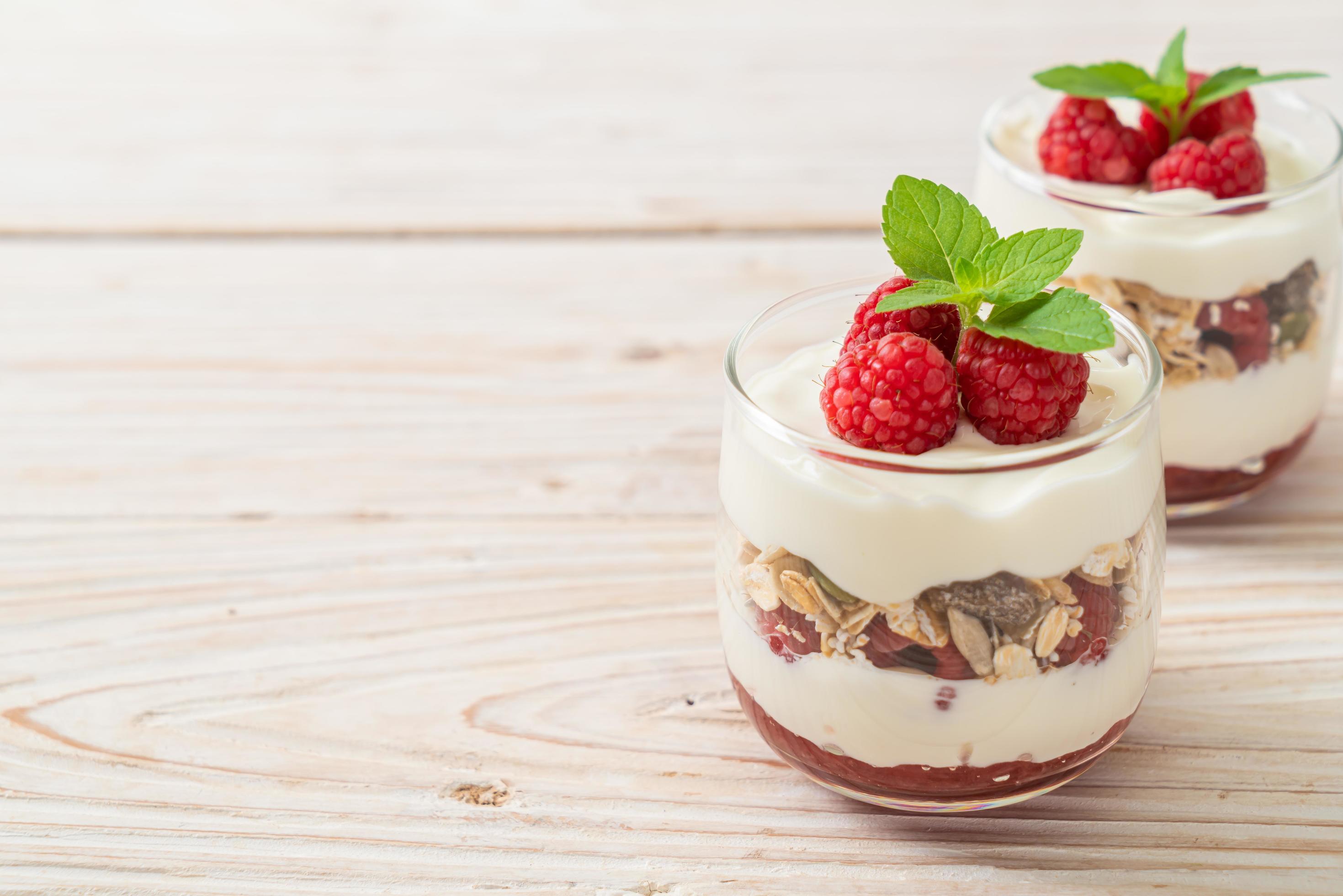 Fresh raspberry and yogurt with granola – Healthy food style Stock Free