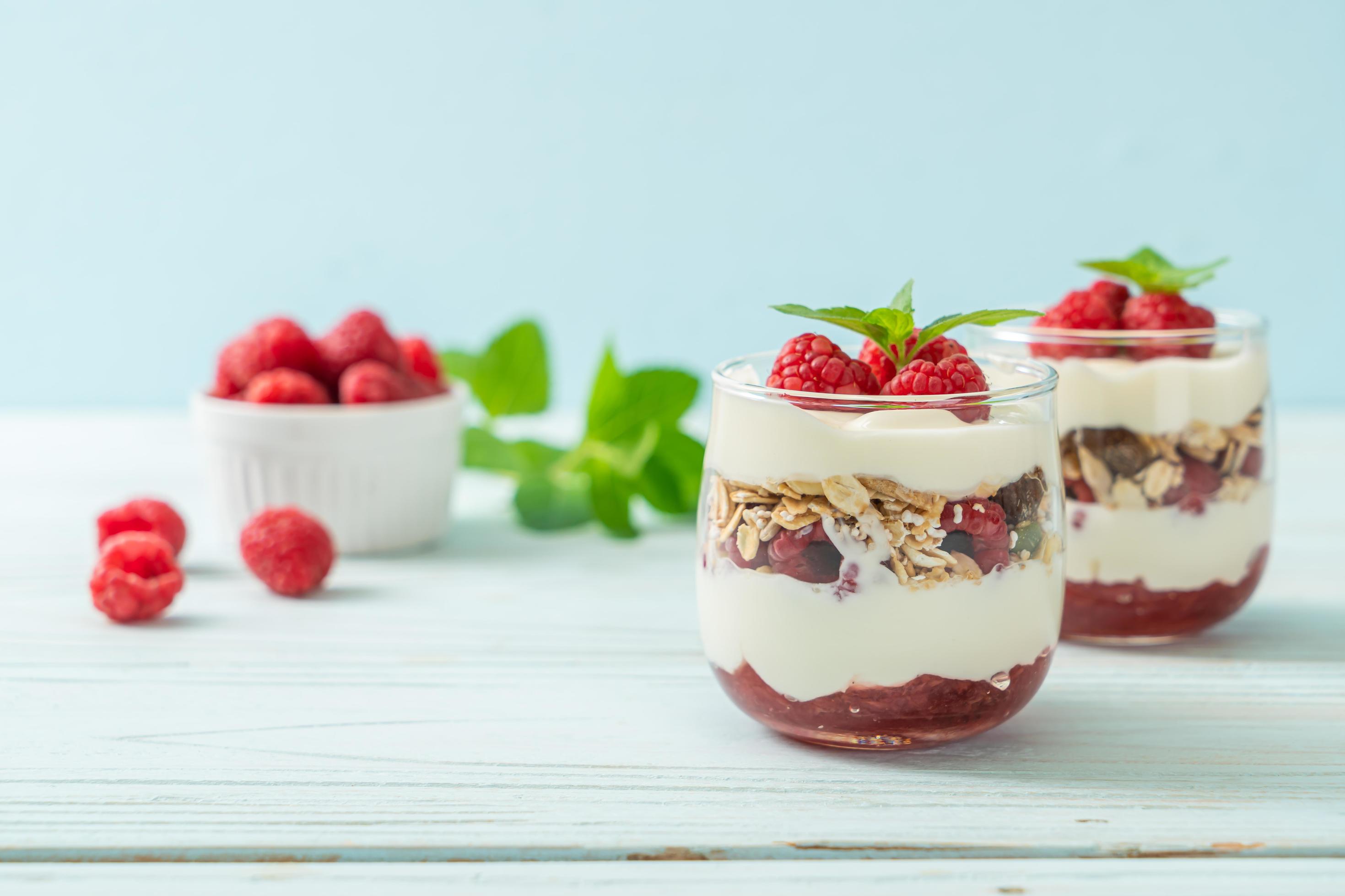 Fresh raspberry and yogurt with granola – Healthy food style Stock Free