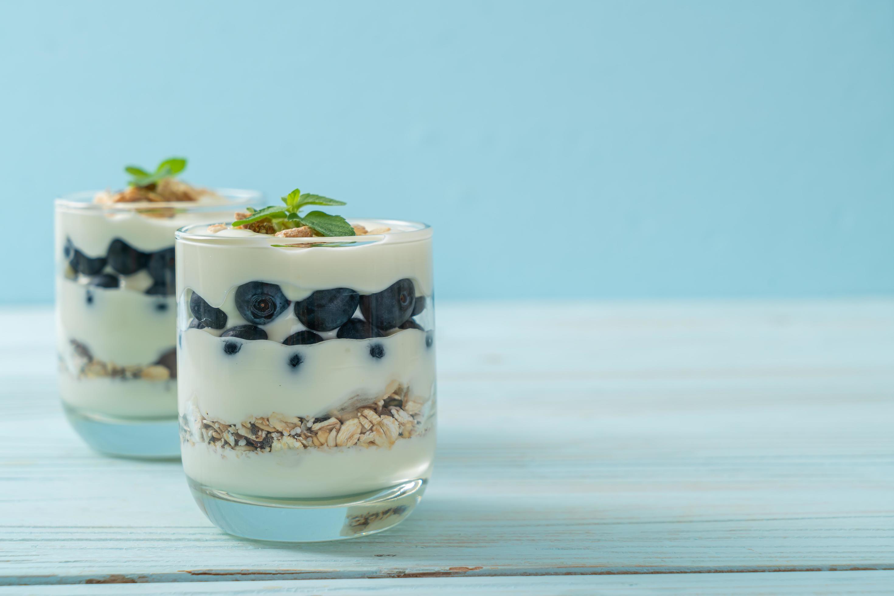 Fresh blueberries and yogurt with granola – Healthy food style Stock Free