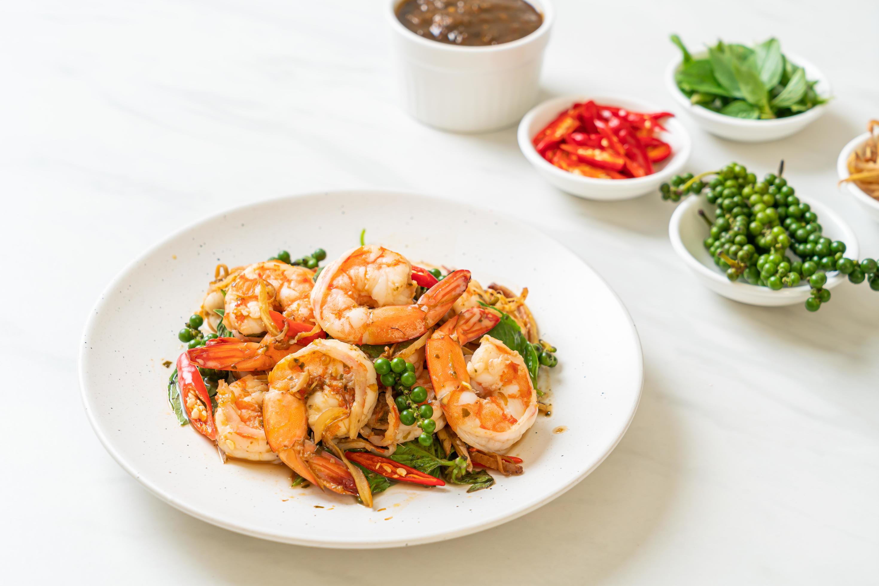 Stir-fried holy basil with shrimps and herb – Asian food style Stock Free