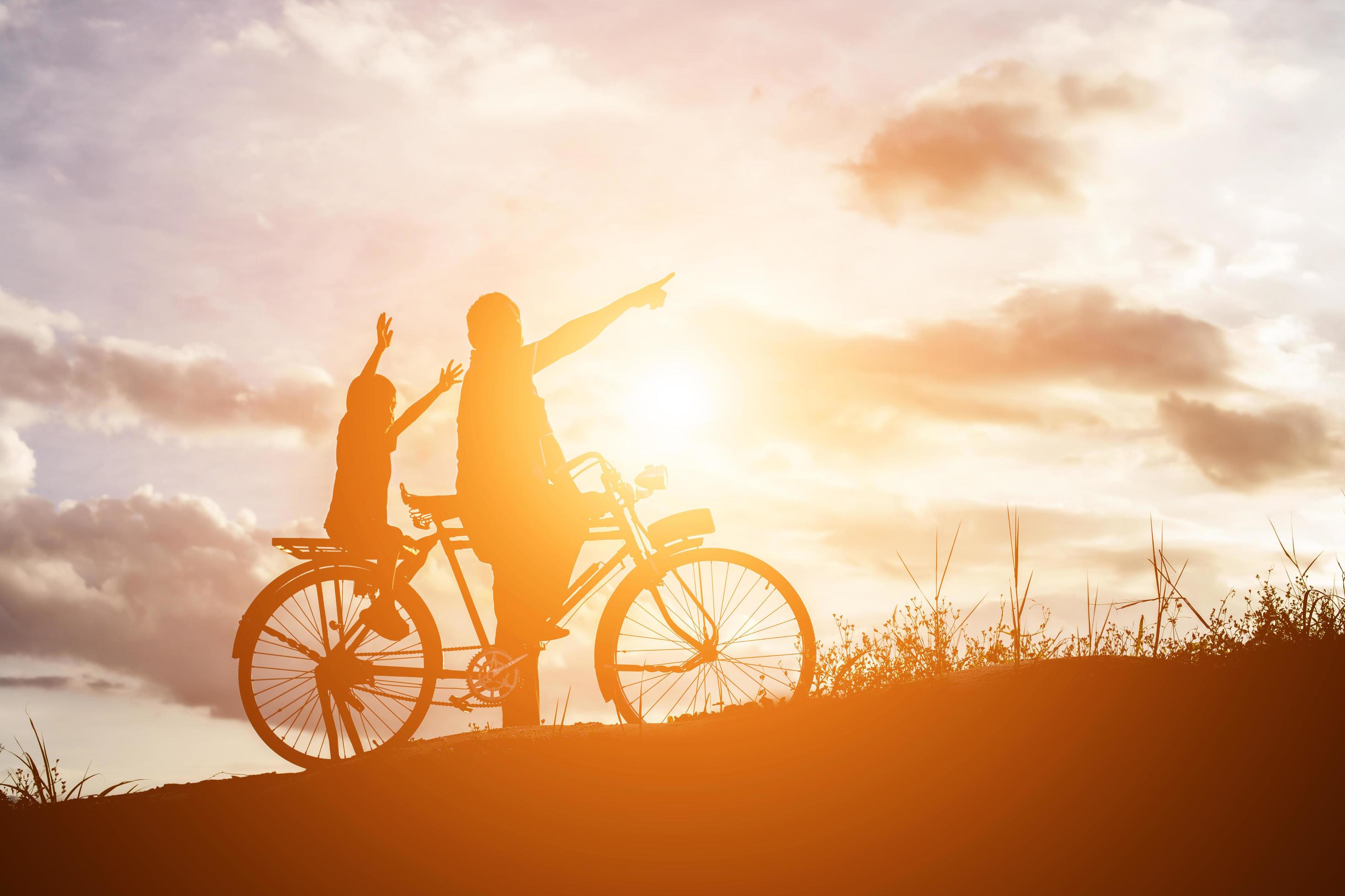 Biker family silhouette father and son Stock Free