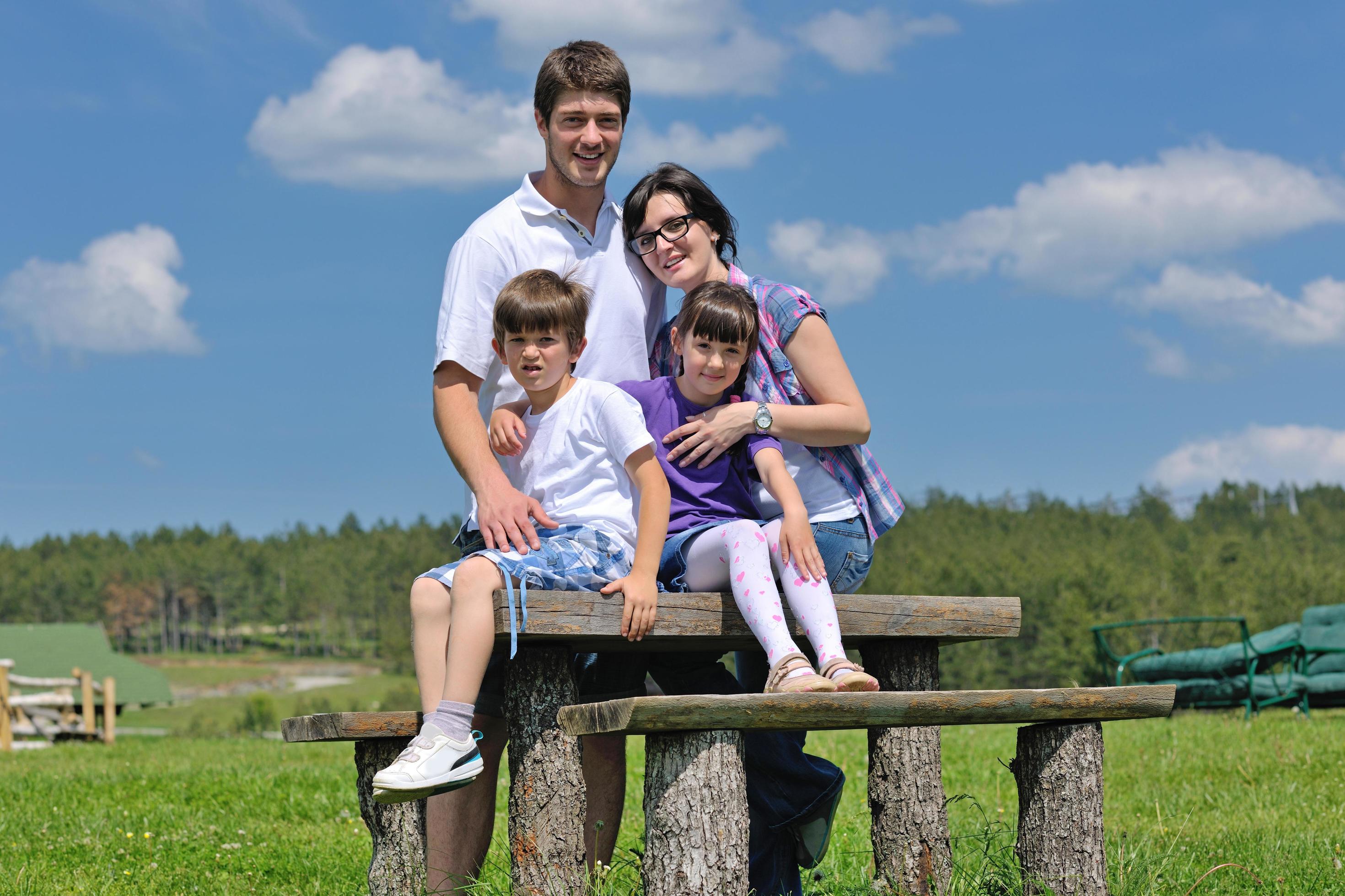 happy young family have fun outdoors Stock Free