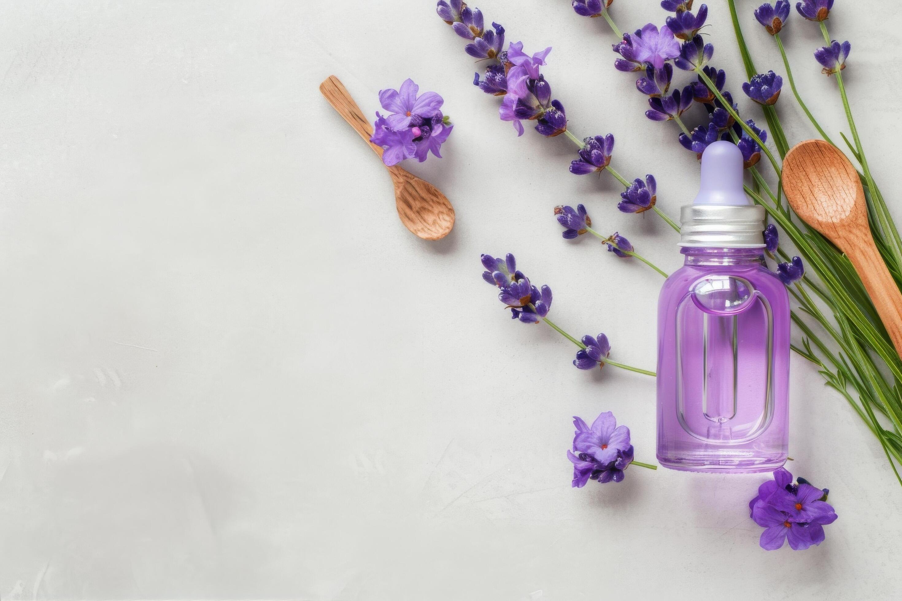 Lavender Essential Oil and Flowers on White Background Stock Free