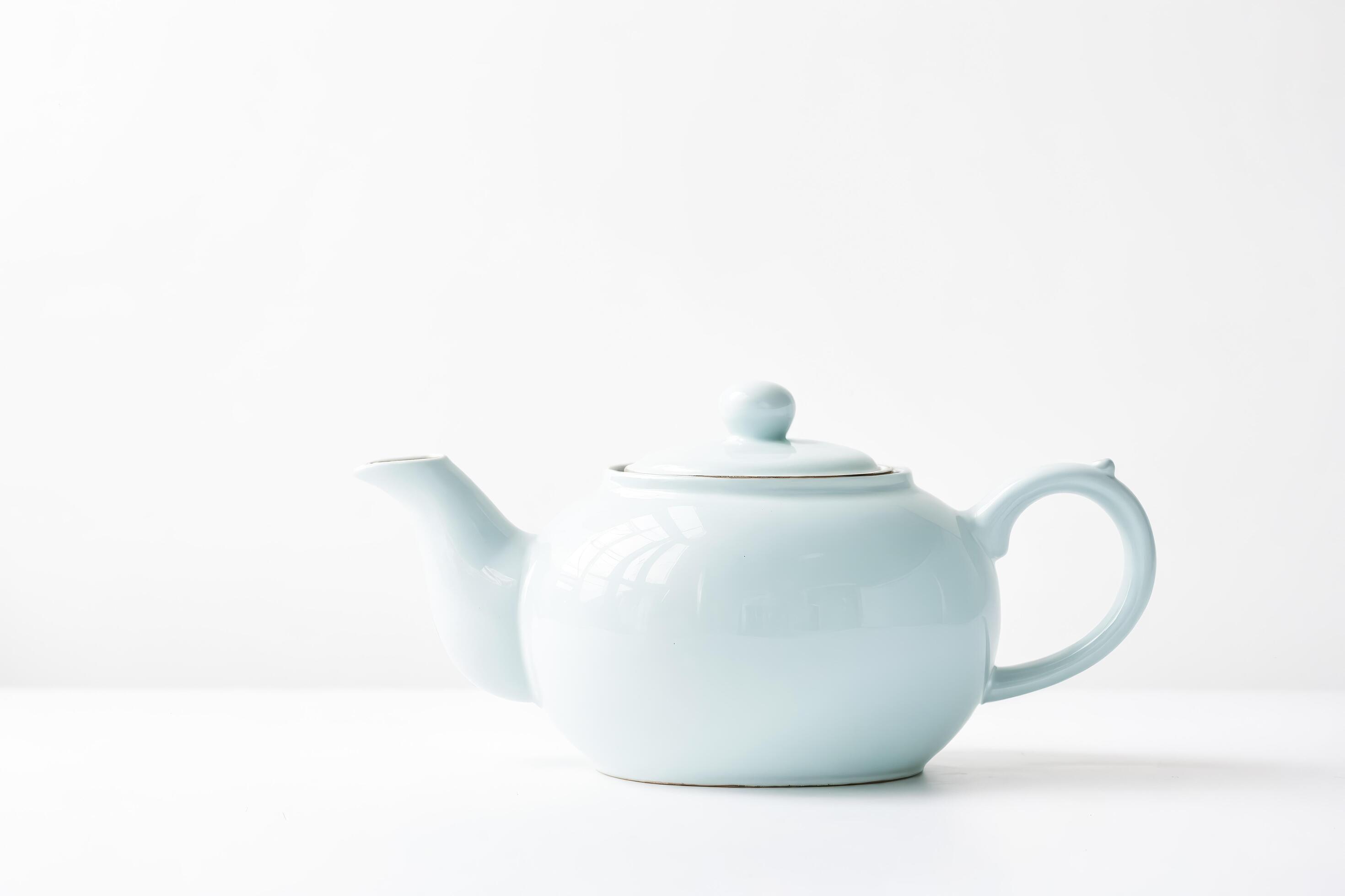 White Teapot with Black Stripe on White Background Stock Free