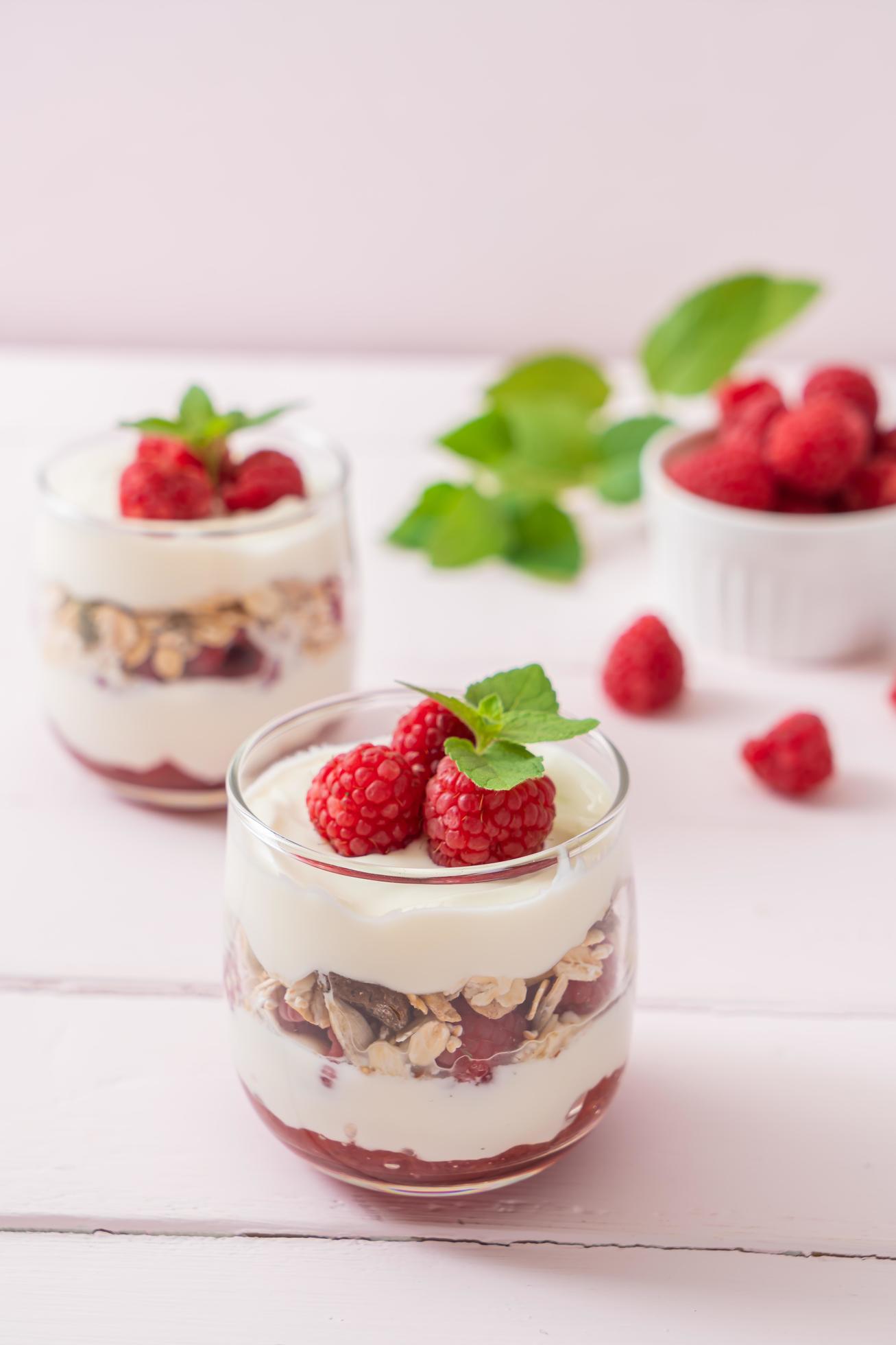 Fresh raspberry and yogurt with granola – Healthy food style Stock Free