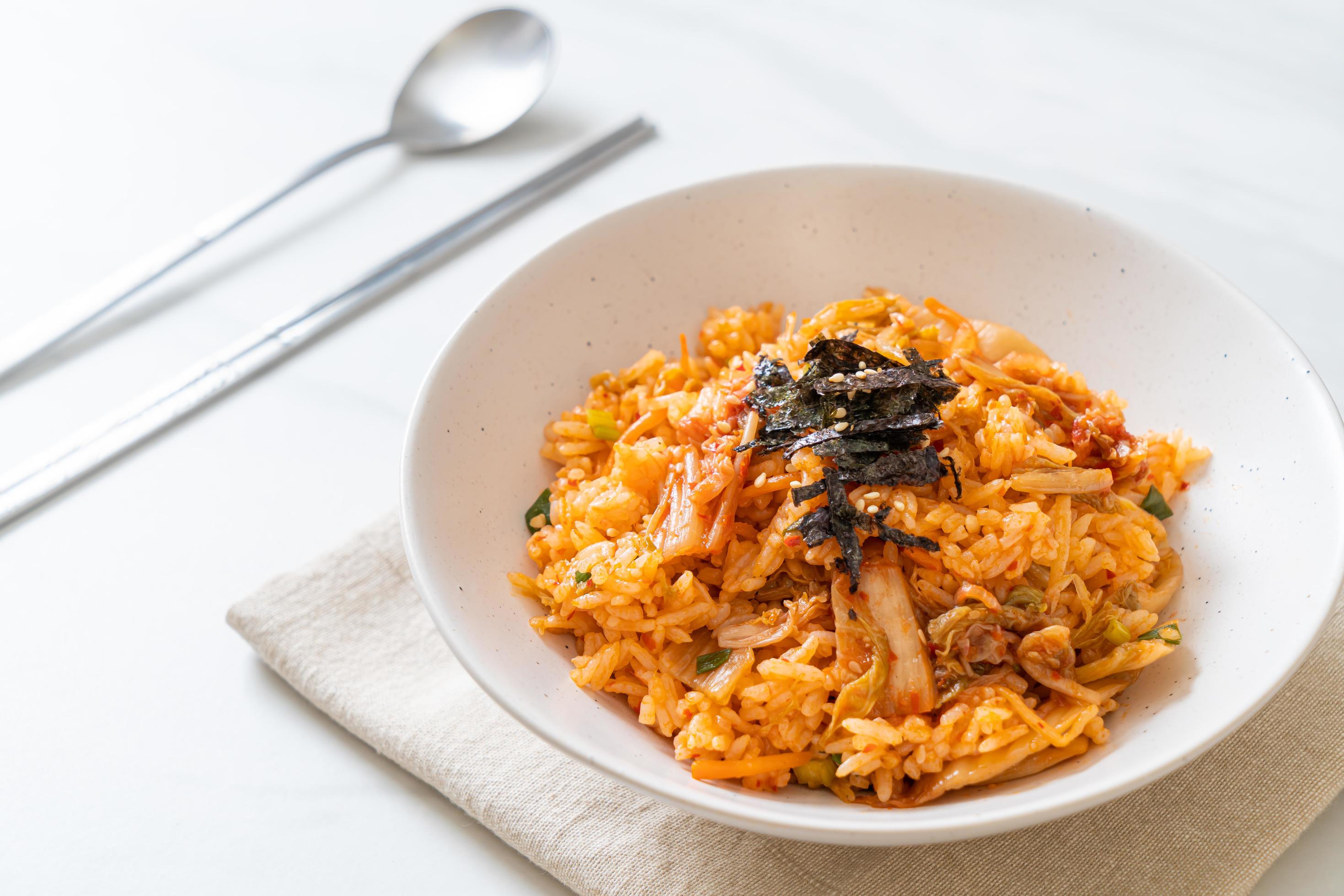 Kimchi fried rice with seaweed and white sesame – Korean food style Stock Free