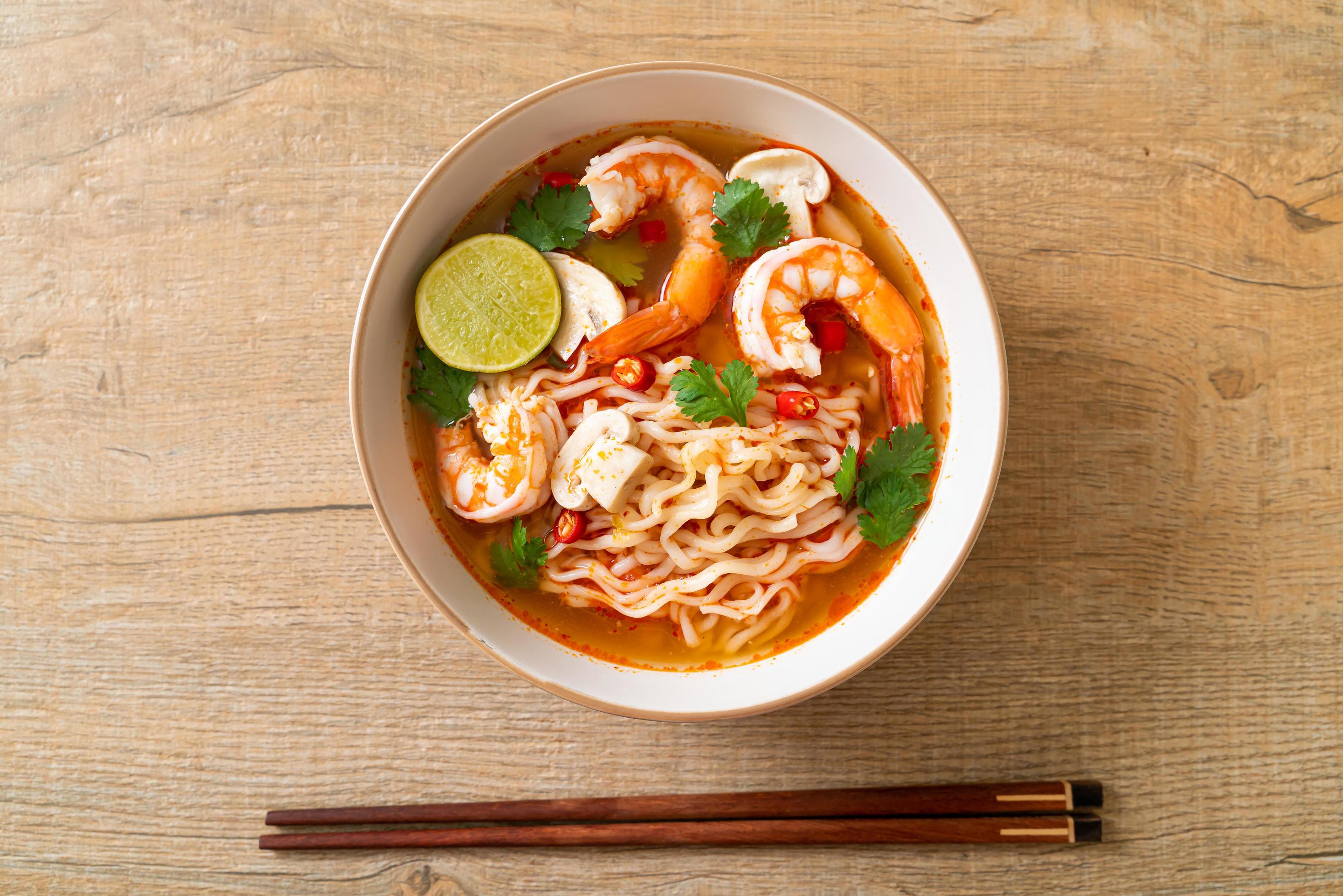 Instant noodles ramen in spicy soup with shrimps – Tom Yum Kung – Asian food style Stock Free